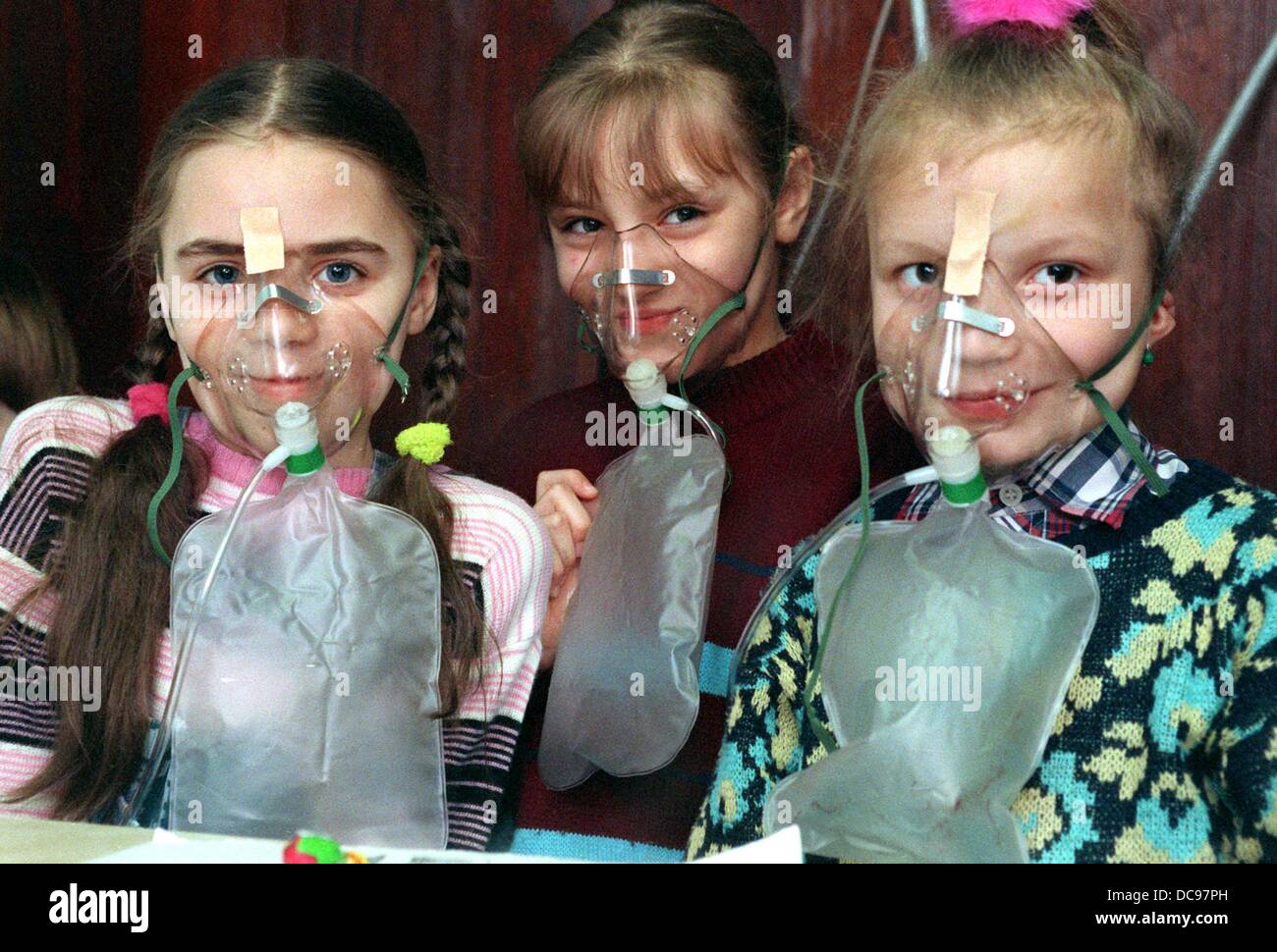 Wiga, Ina and Veronika (l-r) from Chernobyl are treated in a hospital in Leipzig, because their health had been damaged severly by the reactor accident in Chernobyl in May 1986 (picture from the 10th of May in 1991). Stock Photo