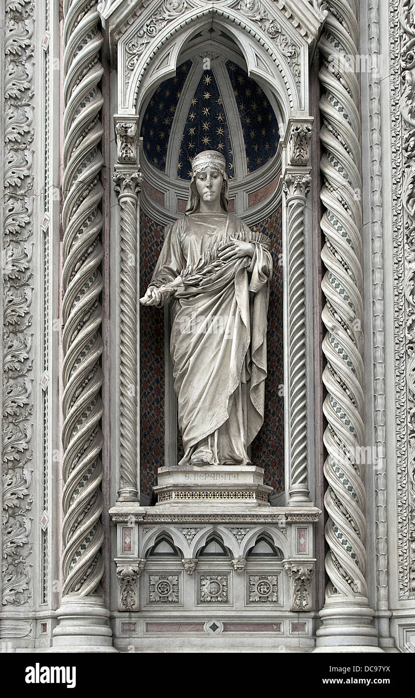 Statue of Saint Reparata, martyr, Patron of Florence, Italy. Main portal of the cathedral Santa Maria del Fiore. Stock Photo