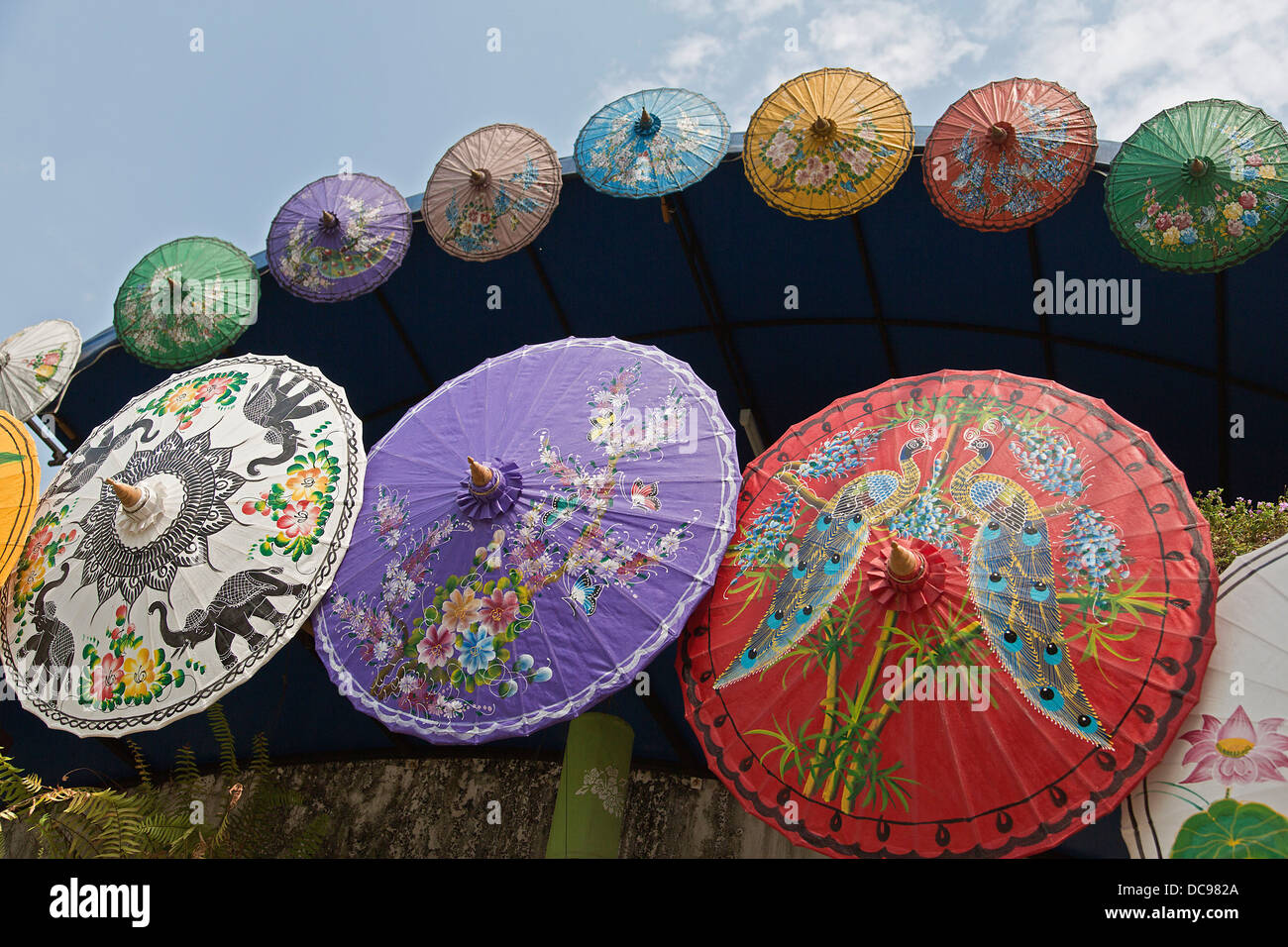 Brightly painted Asian sun umbrellas made of paper Stock Photo