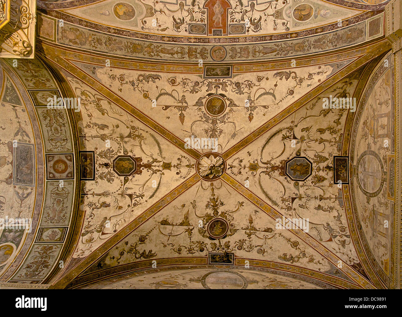 'Grotesque' painted fresco ceiling by Giorgio Vasari, in 'cortile de Michelozzo' in Palazzo Vecchio of Florence, Italy. Stock Photo