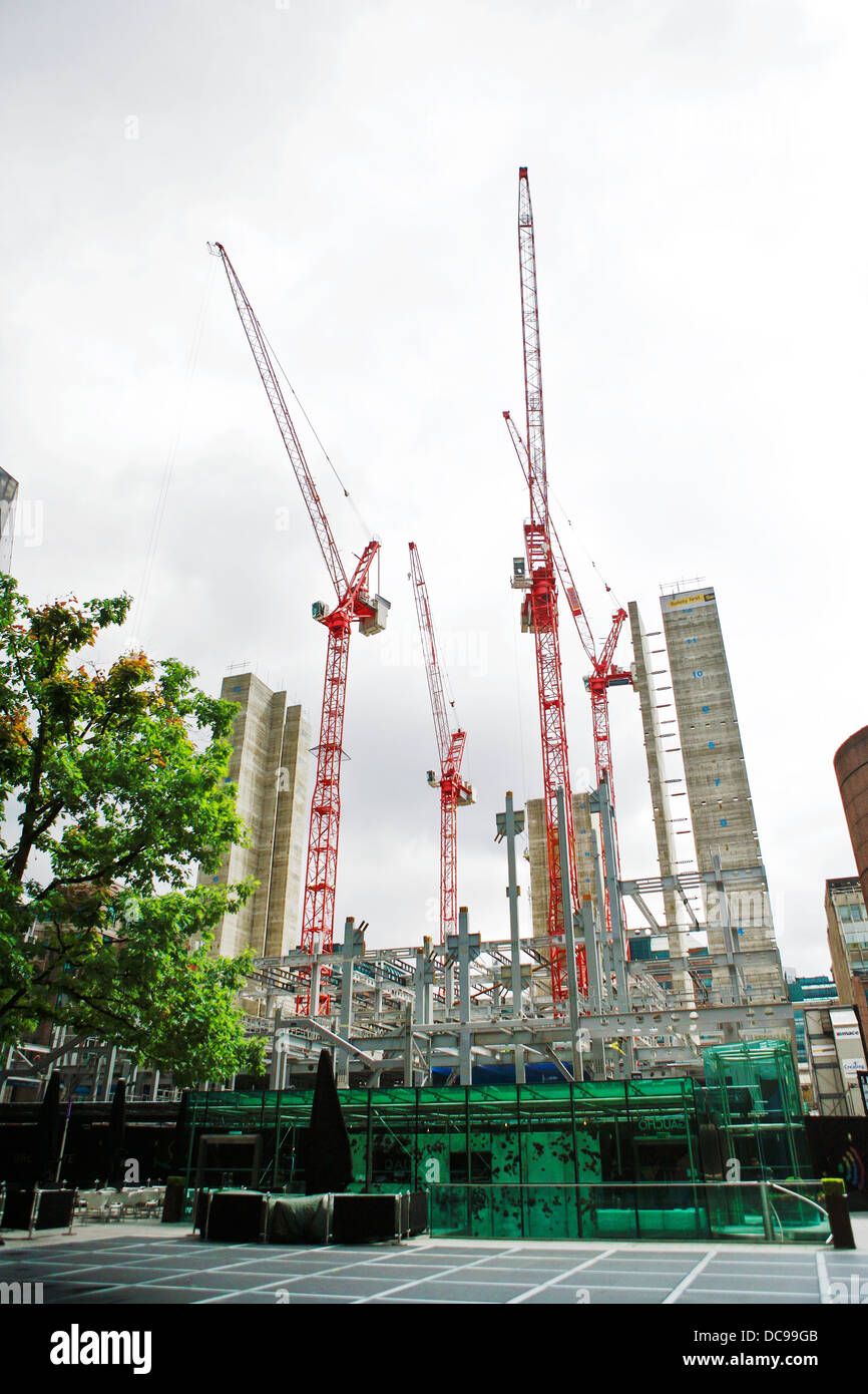 Construction cranes / partially completed lift shafts of UBS new offices at 5 Broadgate in Central London Stock Photo