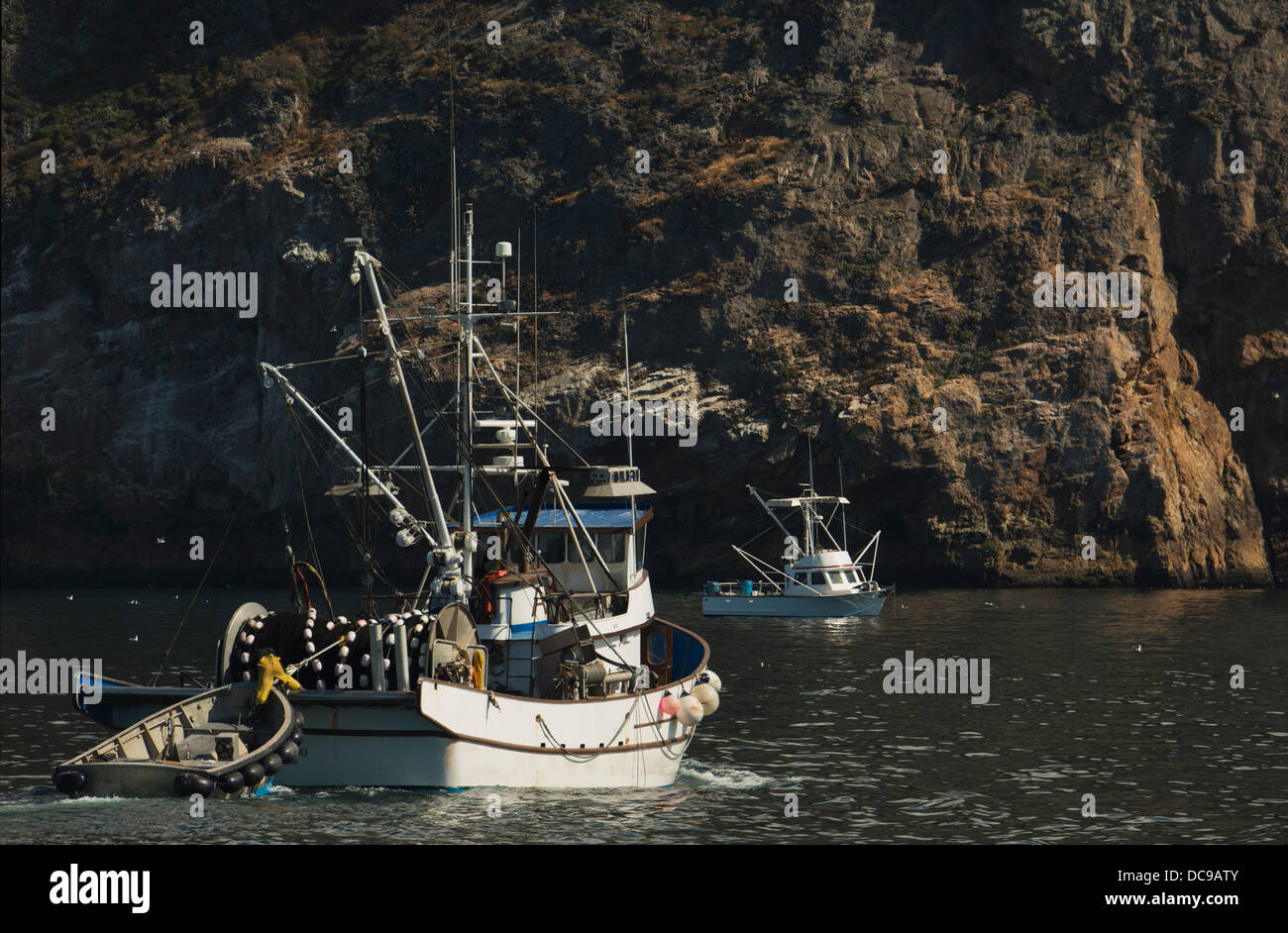 Fishing boats at anchor, north shore of Santa Cruz Island, Channel Islands National Park, California Stock Photo