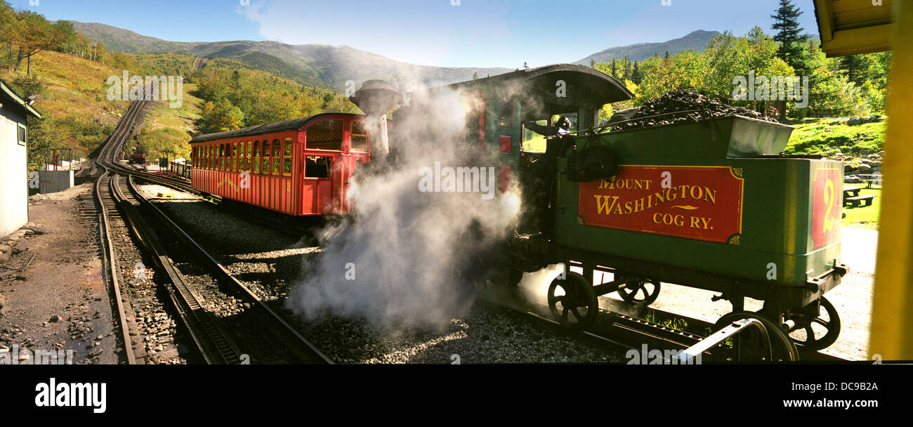 The Cog railway-at  Mount Washington gets up steam to take tourists to the top of the mountain which it has been doing sbce 1869 Stock Photo