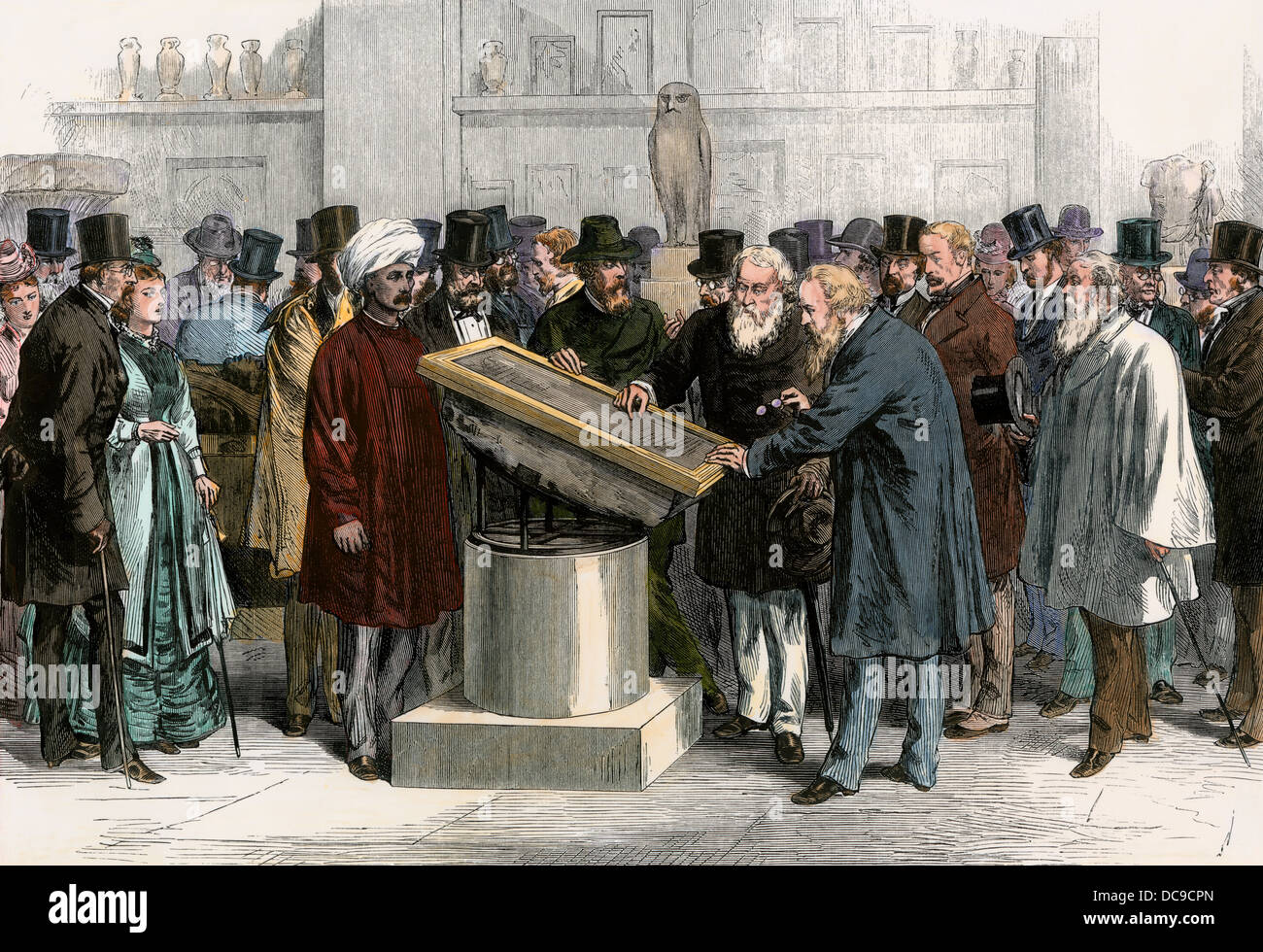 Crowds examining the Rosetta Stone exhibited at the British Museum, 1874. Hand-colored woodcut Stock Photo