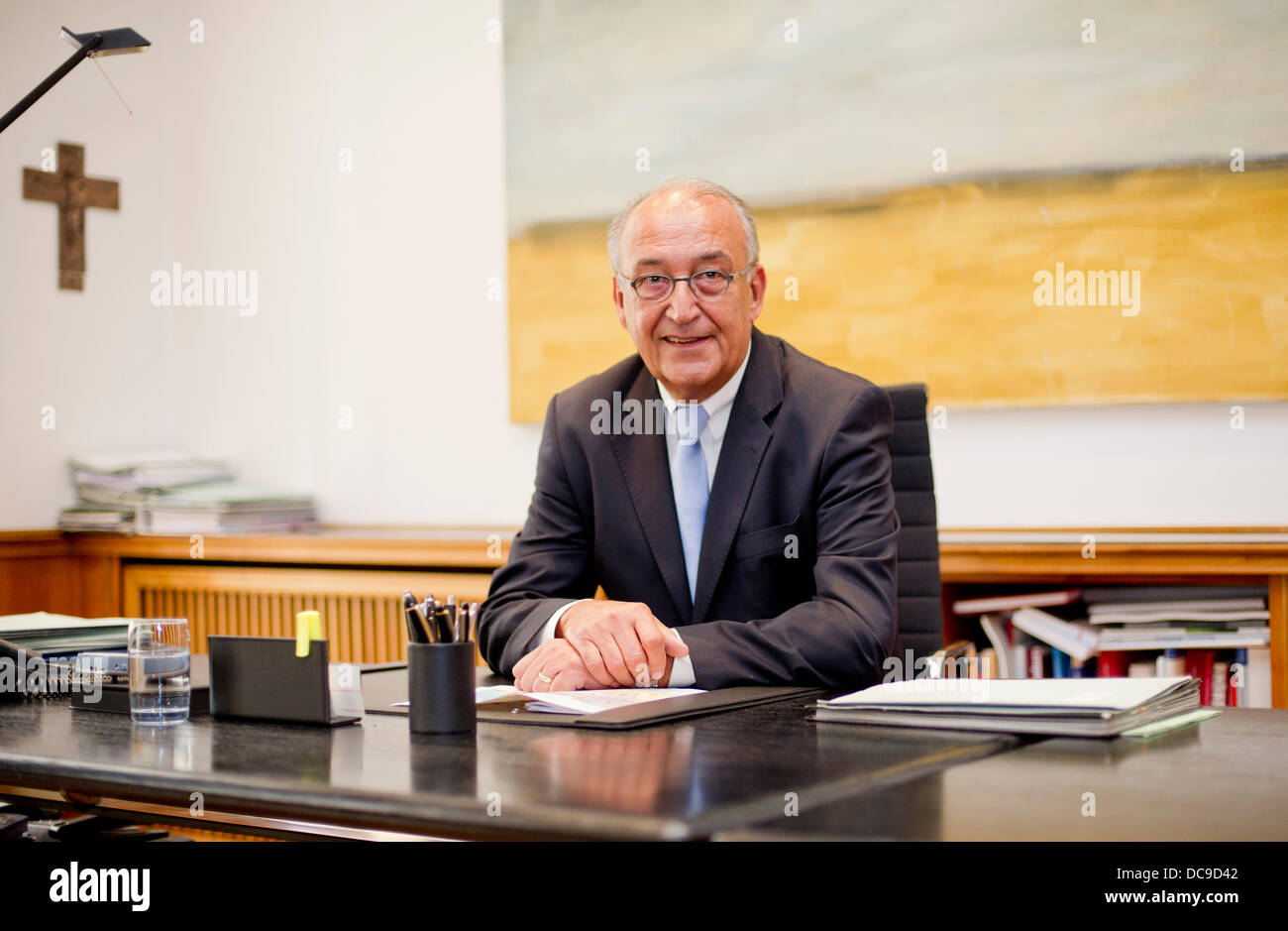 Mayor of Neuss Herbert Napp sits in his office in city hall in Neuss, Germany, 13 August 2013. Napp is planning to challenge an official order that prohibits him from smoking in his office. Photo: JAN-PHILIPP STROBEL Stock Photo