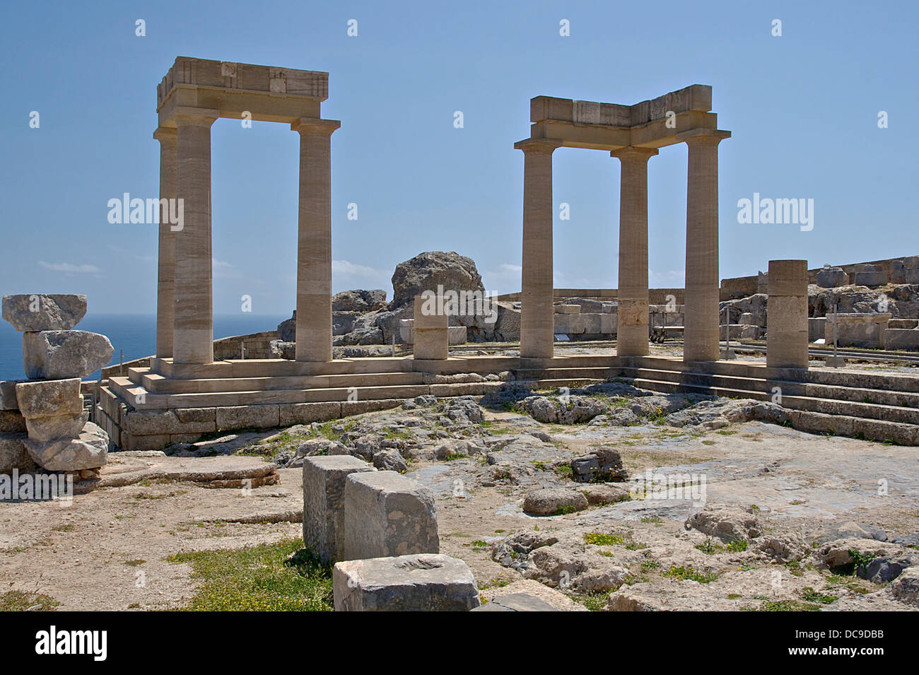 A part of the restorated remains of the doric portico (hellenistic era) of the temple of Athena Lindia, Acropolis of Lindos, Isl Stock Photo