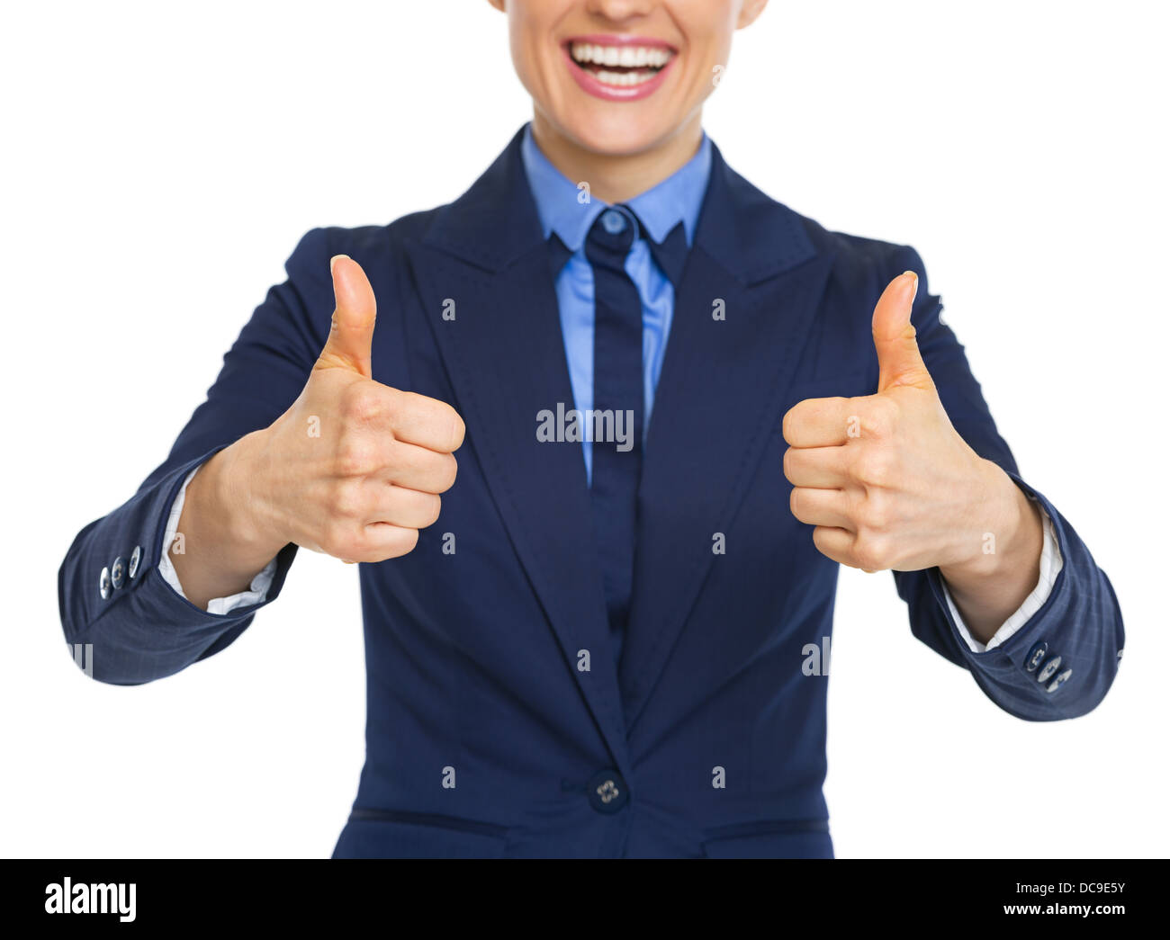 Closeup on smiling business woman showing thumbs up Stock Photo - Alamy