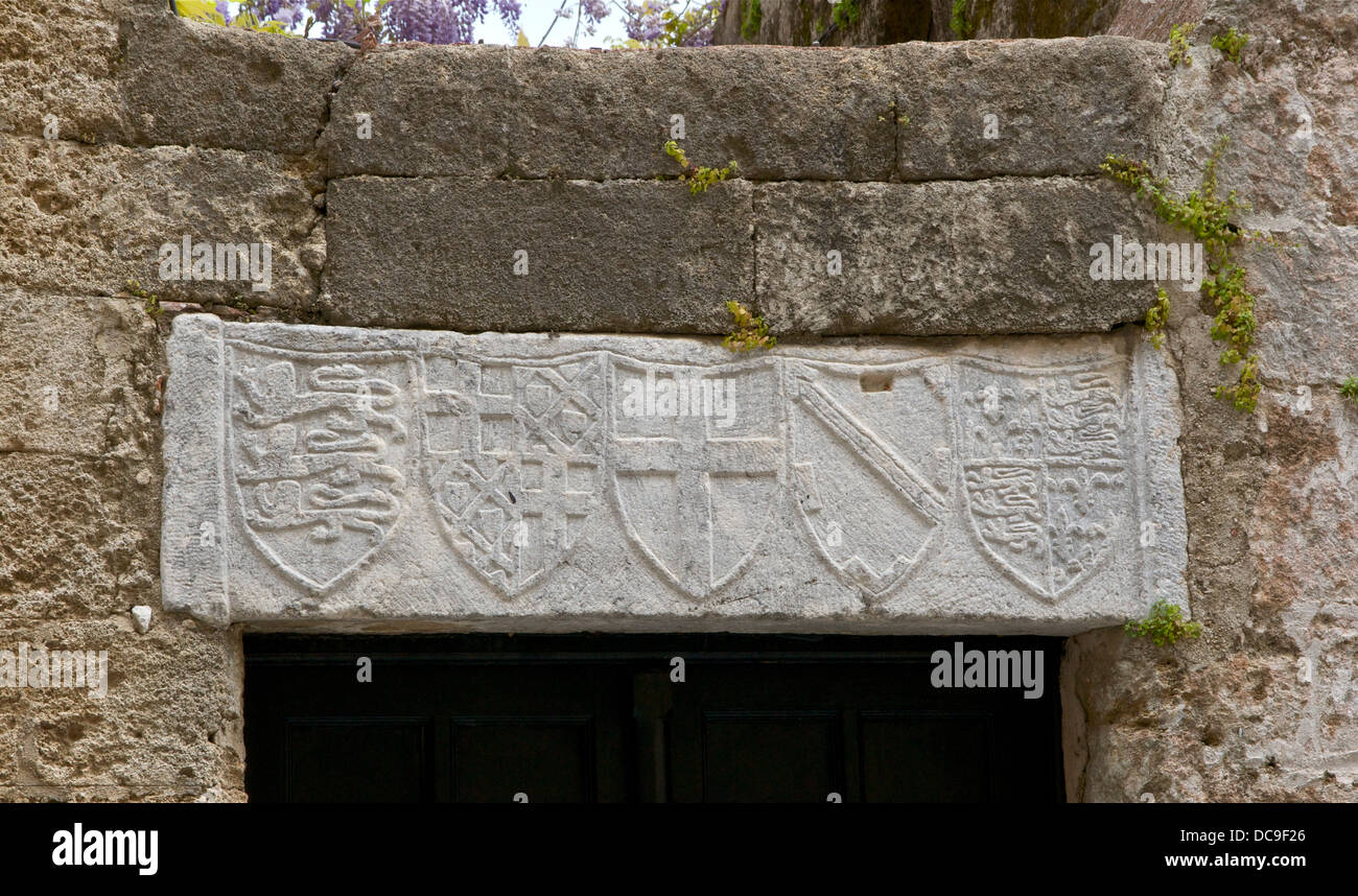 A lintel in Ippoton street in Rhodes, featuring the CoA of kingdom of England, of 26th Grand Master Hélion de Villeneuve, of the Stock Photo