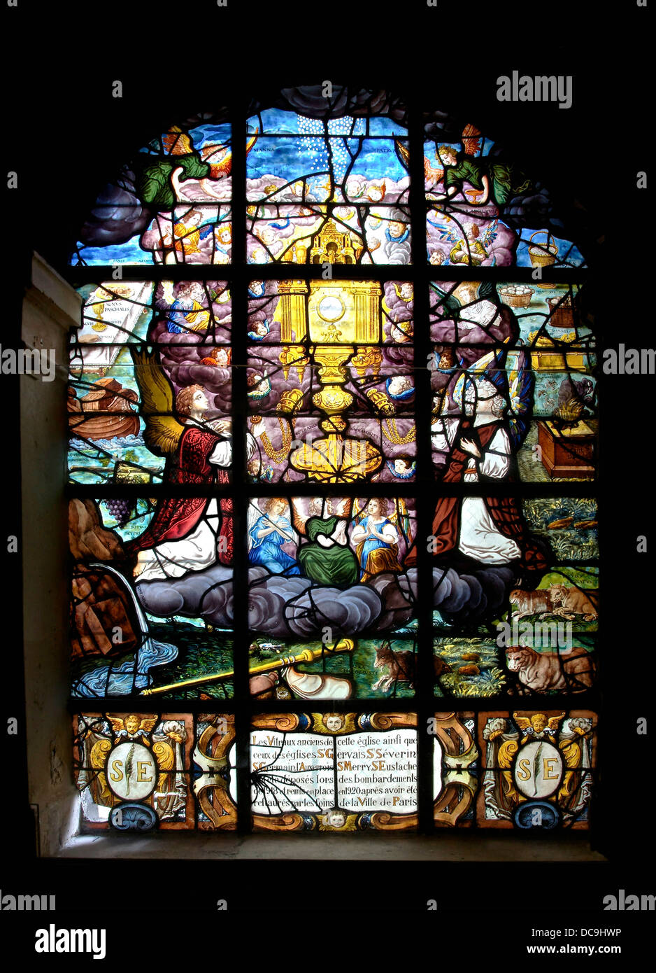Chapelle des Catéchismes: The Adoration of the Holy Sacrament by Angels. Stained glass window, early 17th century. Church Saint Stock Photo