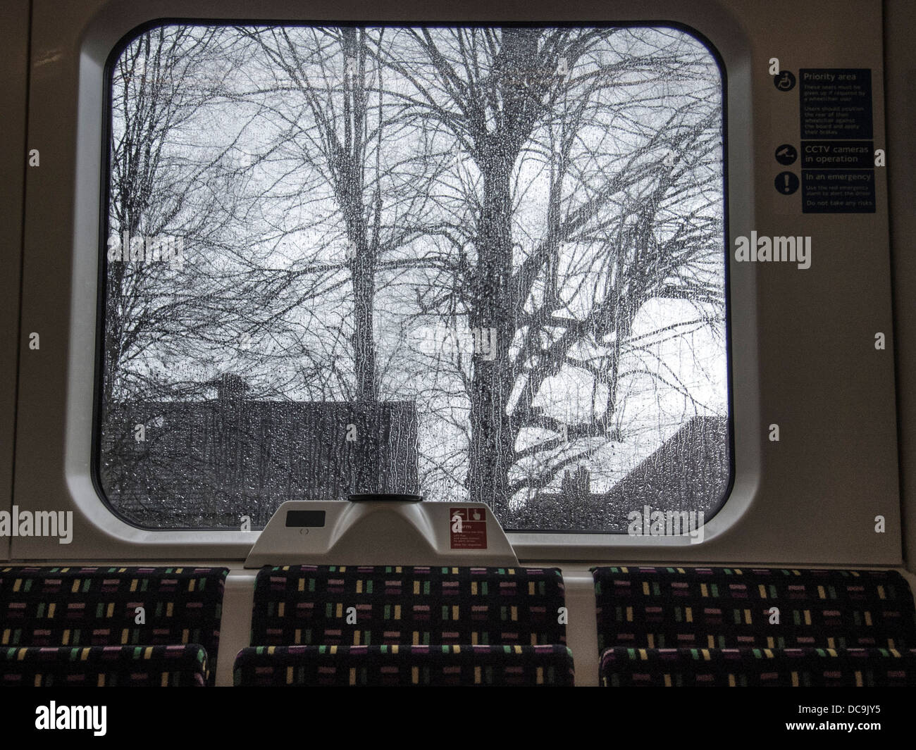 Tube Train Window Raindrops on the window of a tube train in London Stock Photo - Alamy