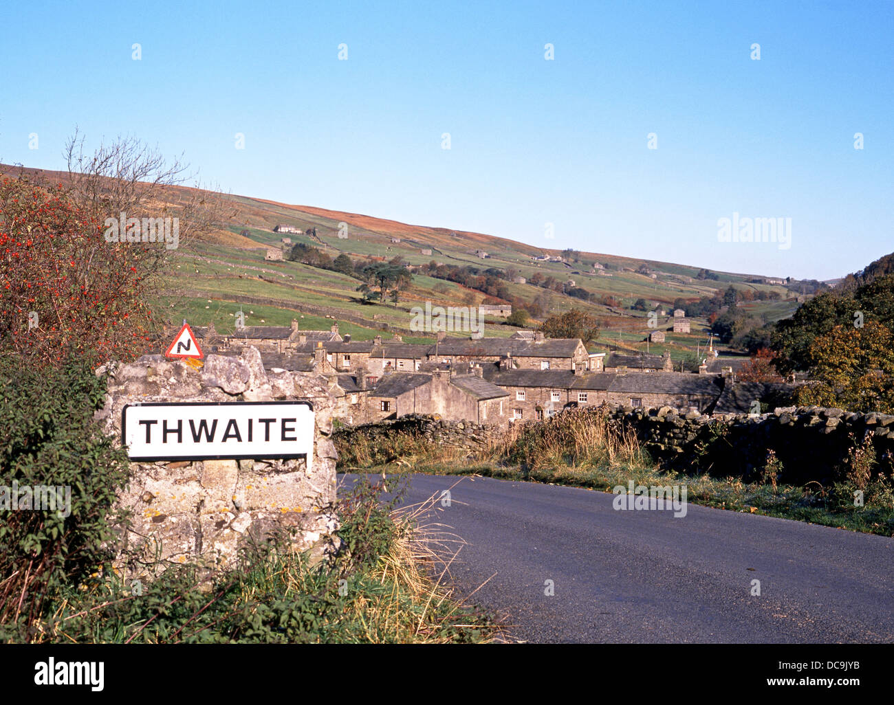 View of the village and surrounding countryside, Thwaite, Yorkshire Dales, North Yorkshire, England, UK, Western Europe. Stock Photo