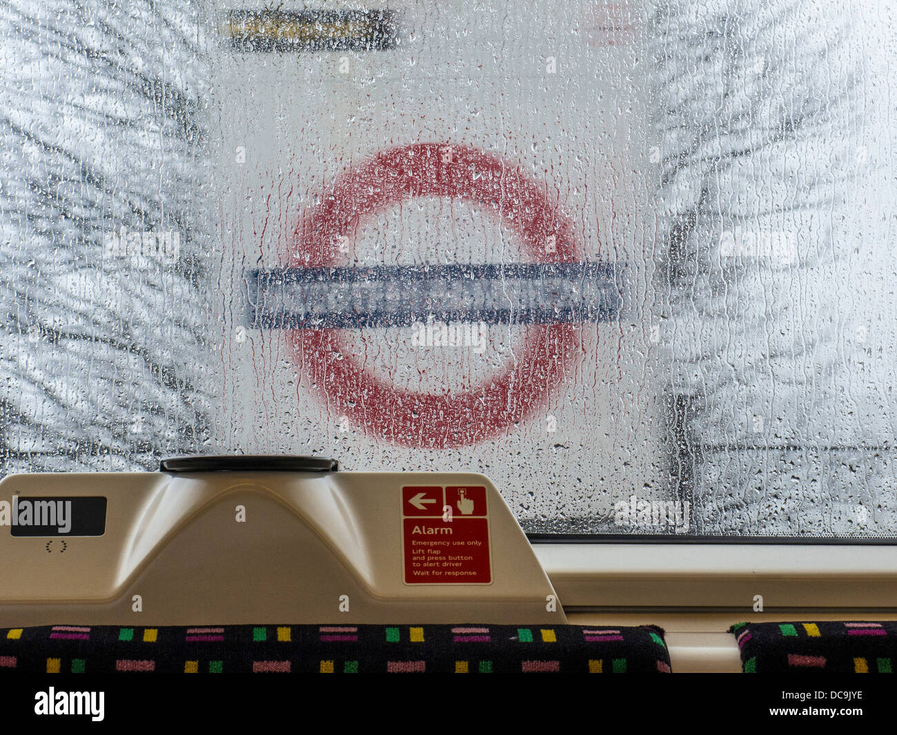 Tube Train Window Raindrops on the window of a tube train in London Stock Photo - Alamy