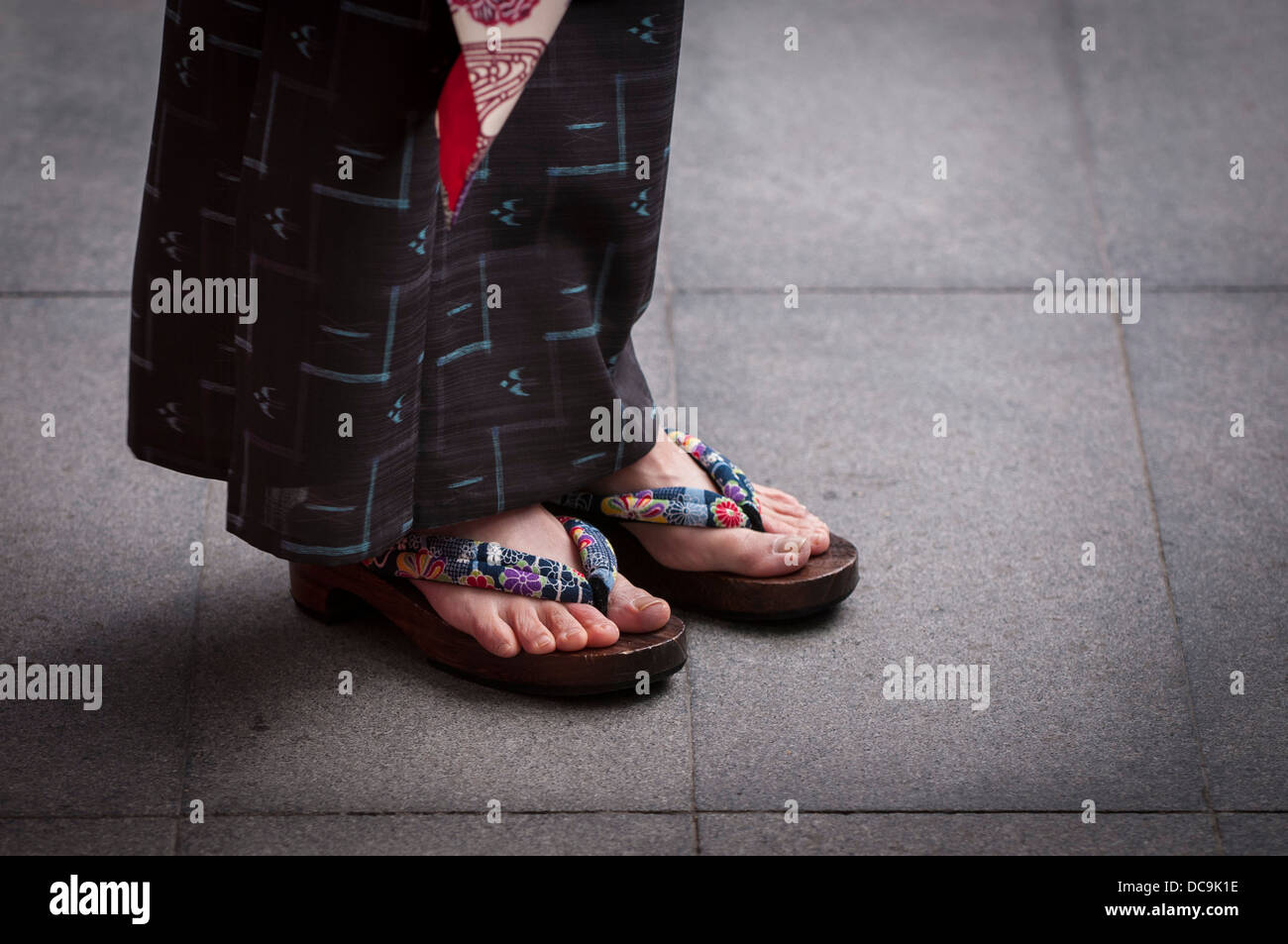 The feet of a woman wearing traditional Japanese dress Stock Photo
