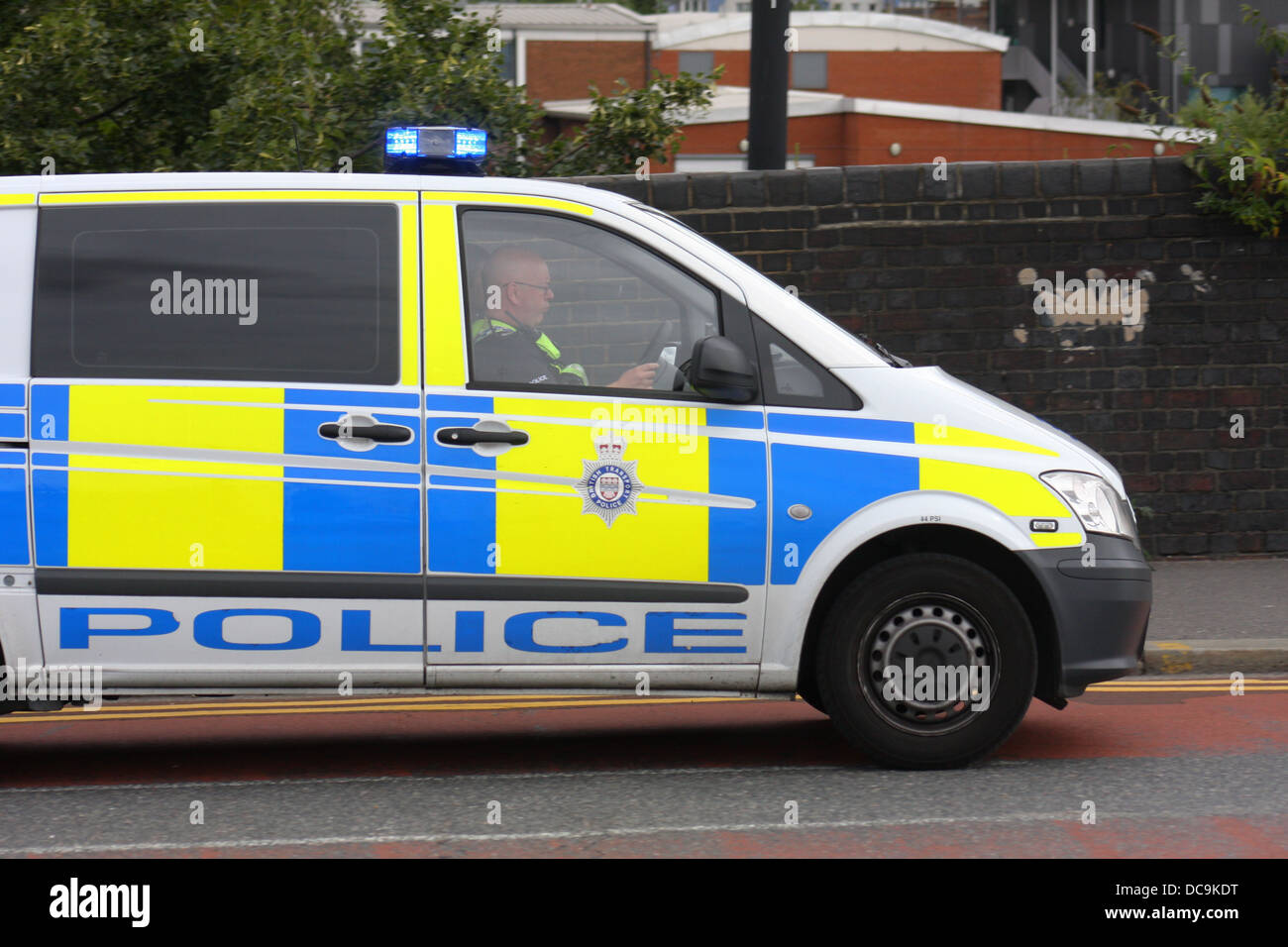 Police Van on urgent response in east London Stock Photo