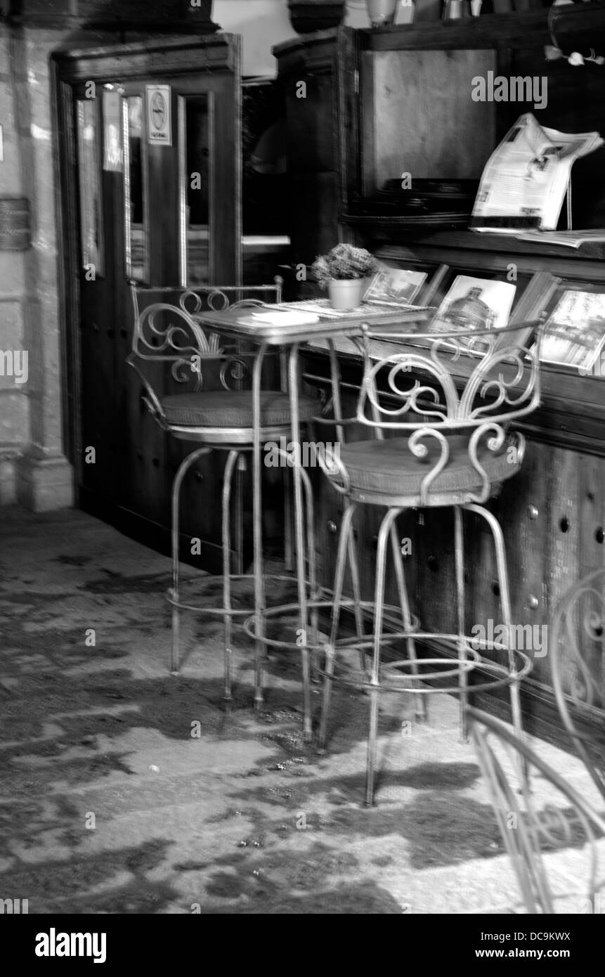 two chairs together at a bar Stock Photo Alamy