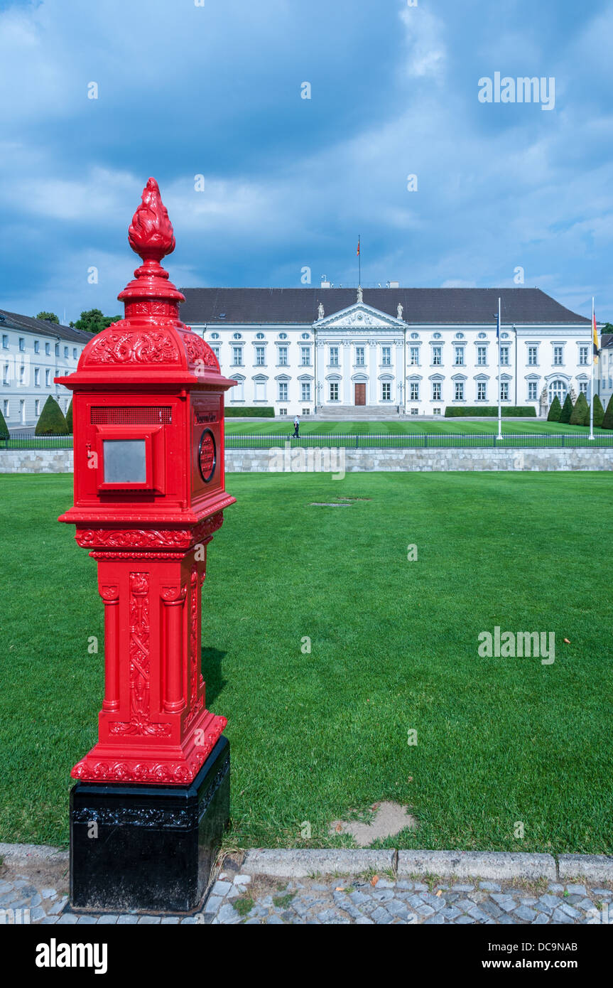 Historic red firebox in front of the Bellevue Palace, Schloss Bellevue, residence of the President of Germany, Berlin Stock Photo