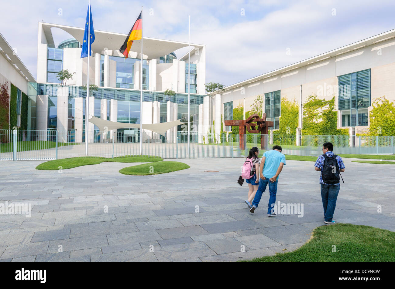 Asian tourists in front of the German Chancellery building - Berlin Germany Stock Photo