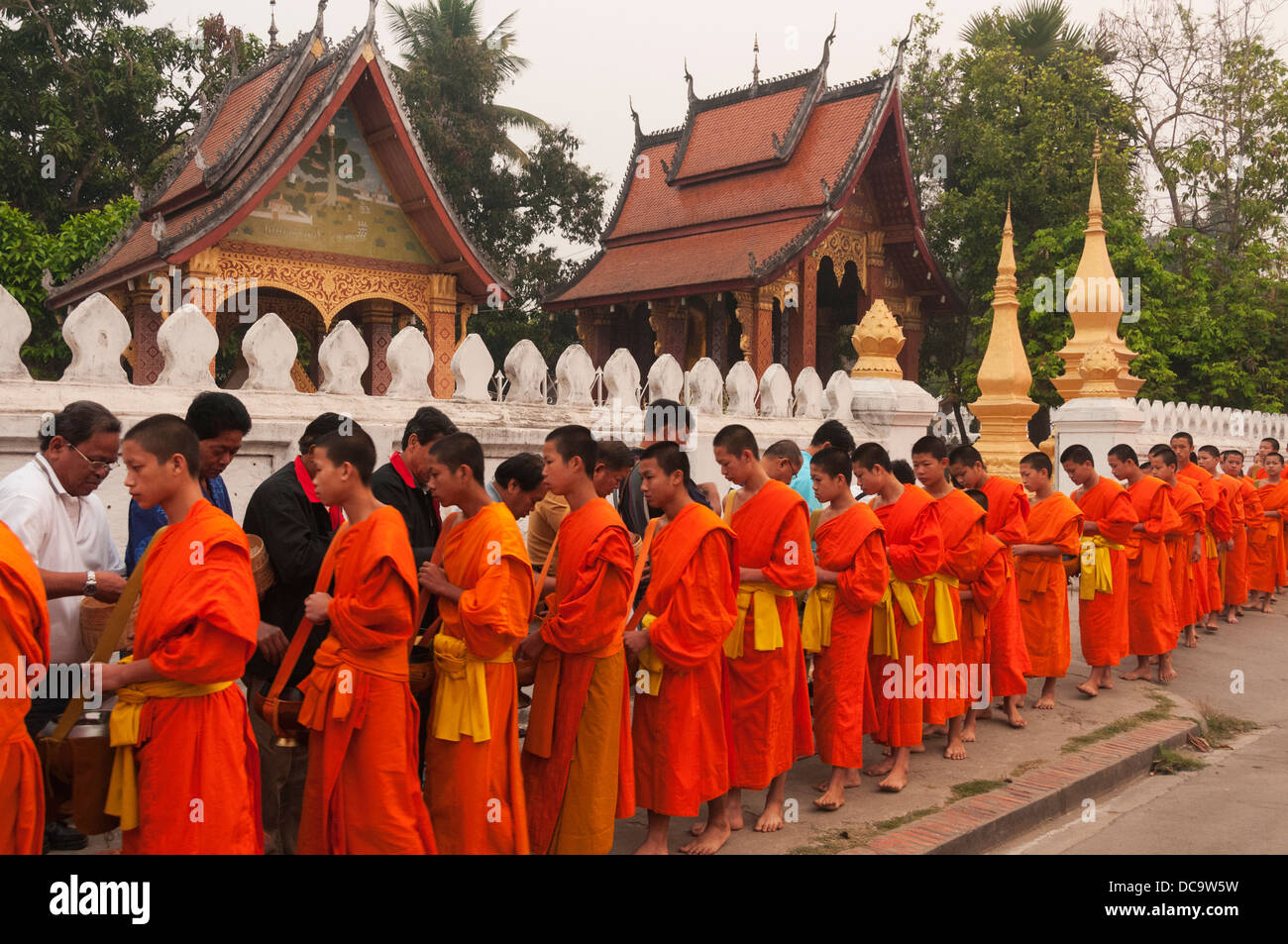Elk209-1280 Laos, Luang Prabang, monks collecting food alms Stock Photo