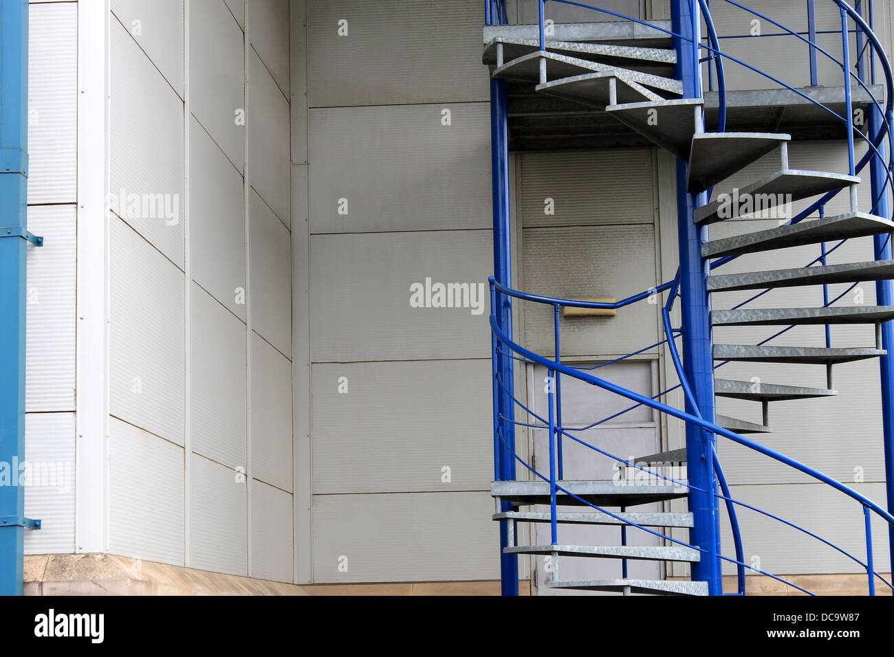 Exterior of spiral emergency exit staircase on modern building. Stock Photo