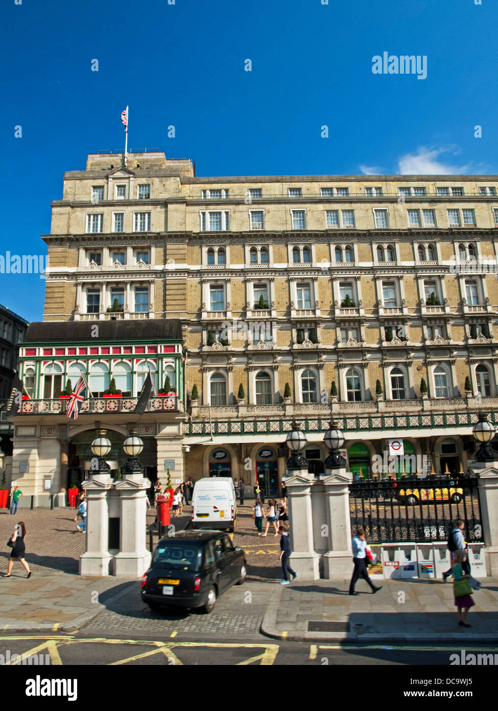 Charing Cross Station entrance showing exterior of Charing Cross Hotel, Strand Stock Photo