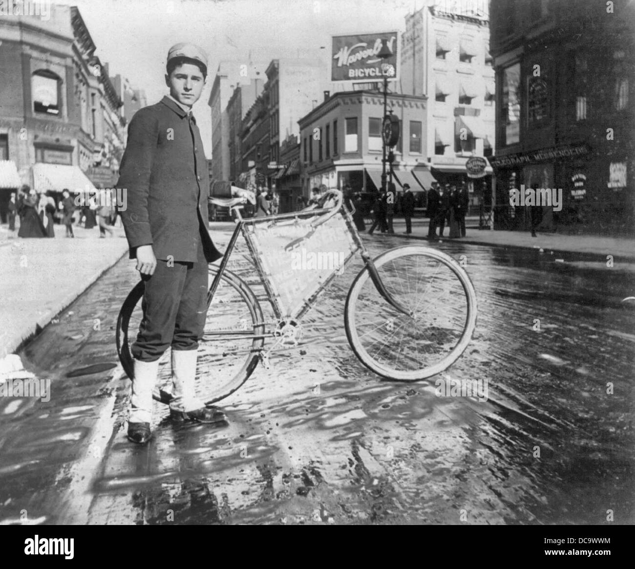 Street types of New York City: Messenger boy and bike, 1896 Stock Photo