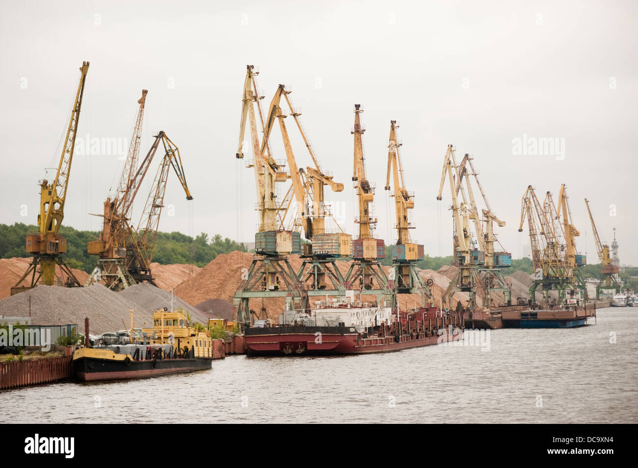 Sand and gravel cargo port along Moscow Canal and ships loaded Russia Stock Photo