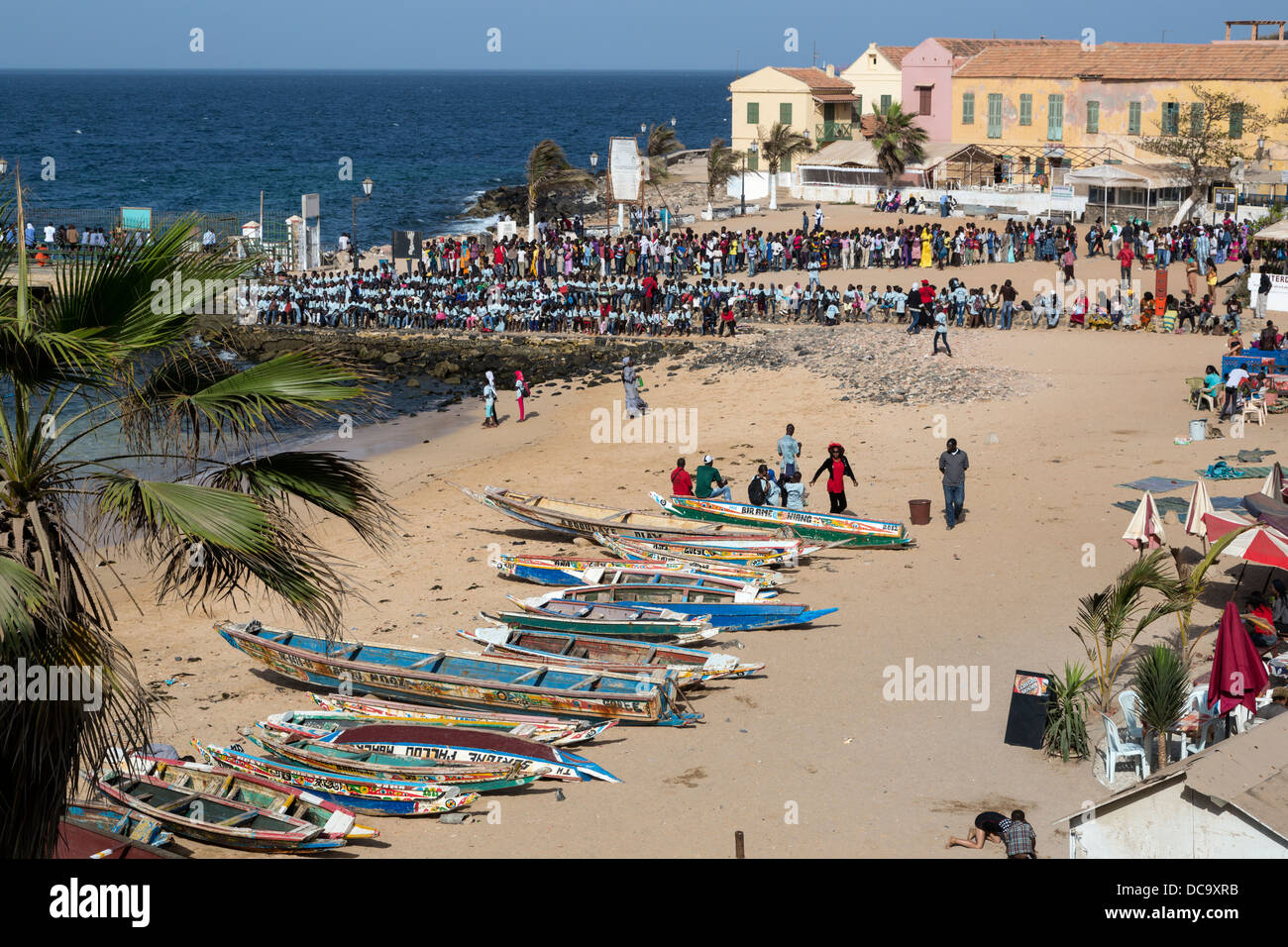 School Groups Waiting to Board the Ferry back to Dakar. Goree Island, Senegal. Stock Photo