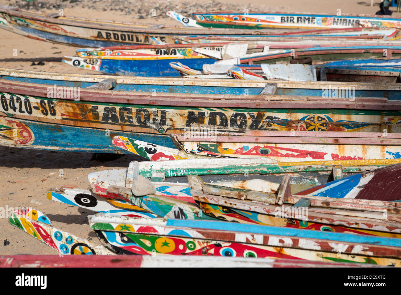 Boats for Fishermen and for Hire by Visitors, on the Beach at Goree Island, Senegal. Stock Photo