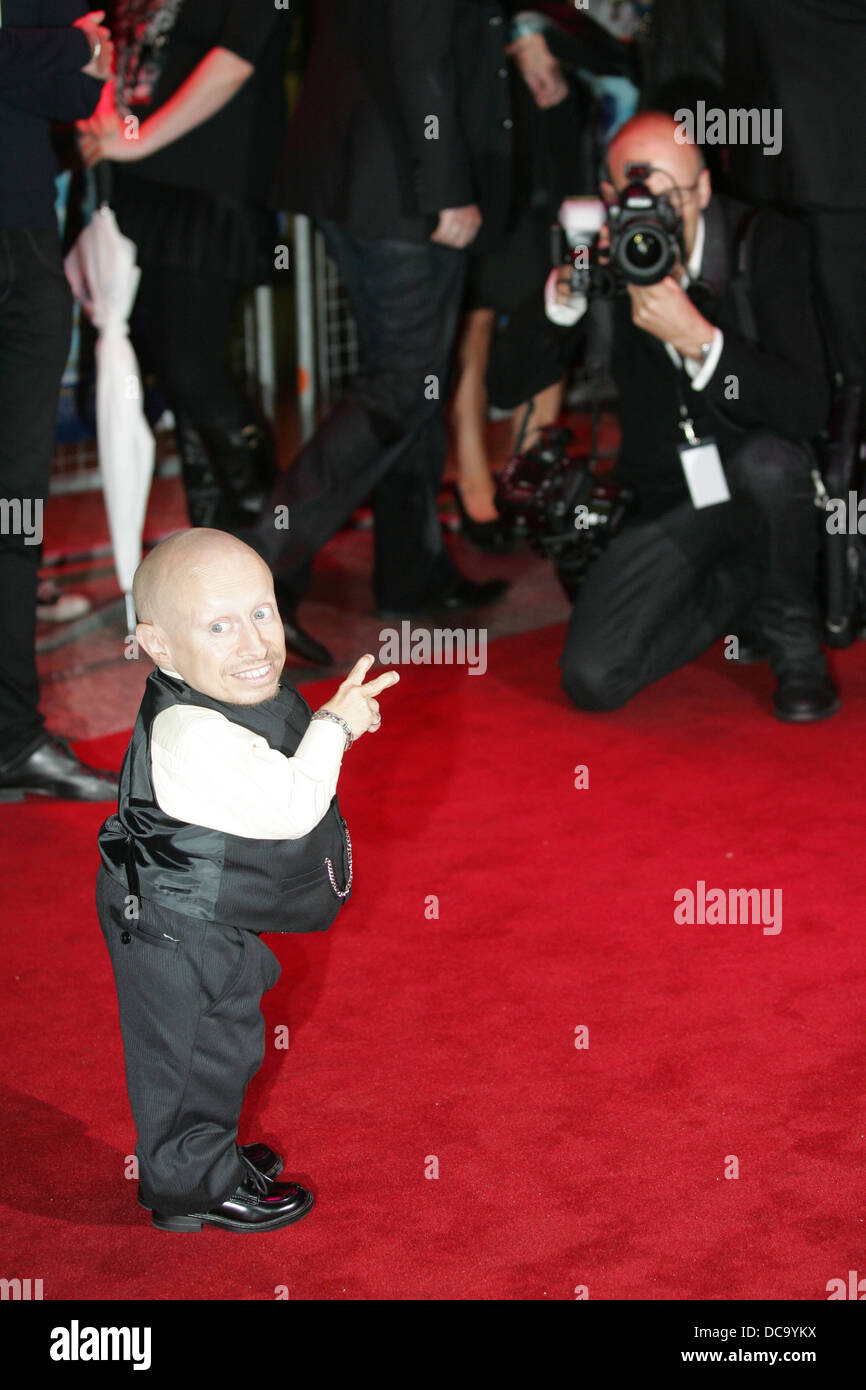 Actor Verne Troyer poses for photographers as he arrives for the