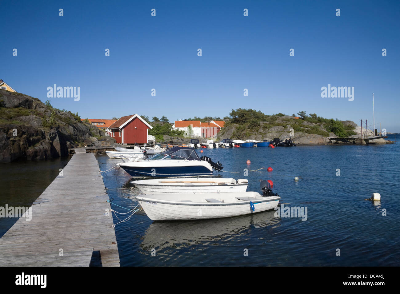 Høvåg Norway Europe Leisurecraft moored in sheltered harbour of small ...