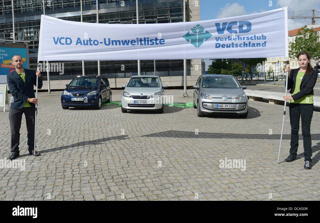 (HANDOUT) A VW handout dated 14 August 2013 shows three compact cars made by Volkswagen Group companies in Berlin, Germany. They top the automotive environmental list (Auto-Umweltliste) for 2013/14. The list from the Verkehrsclub Deutschland (VCD) has given the VW eco up, the Seat Mii Ecofuel and the Skoda Citigo CNS Green tec all the same score in first place. Photo: VW HANDOUT Stock Photo