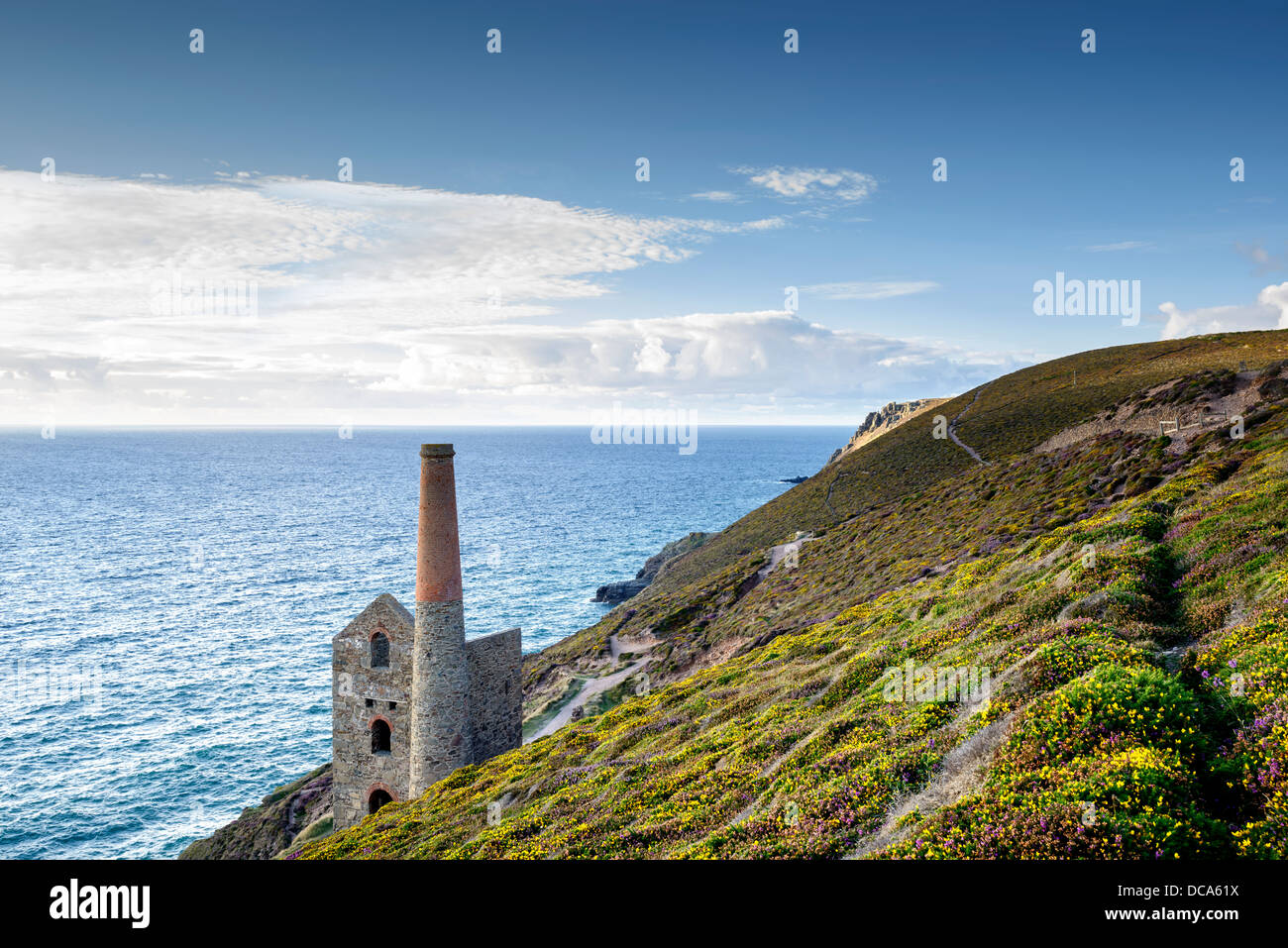 The coast at St Agnes in Cornwall with the Wheal Coates tin mine perched on the edge of the cliffs. Stock Photo