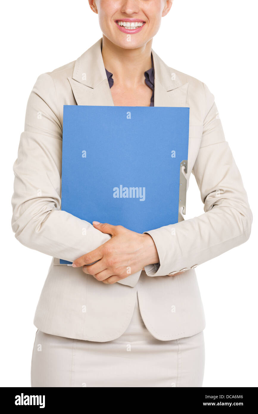 Closeup on smiling business woman holding folder Stock Photo - Alamy