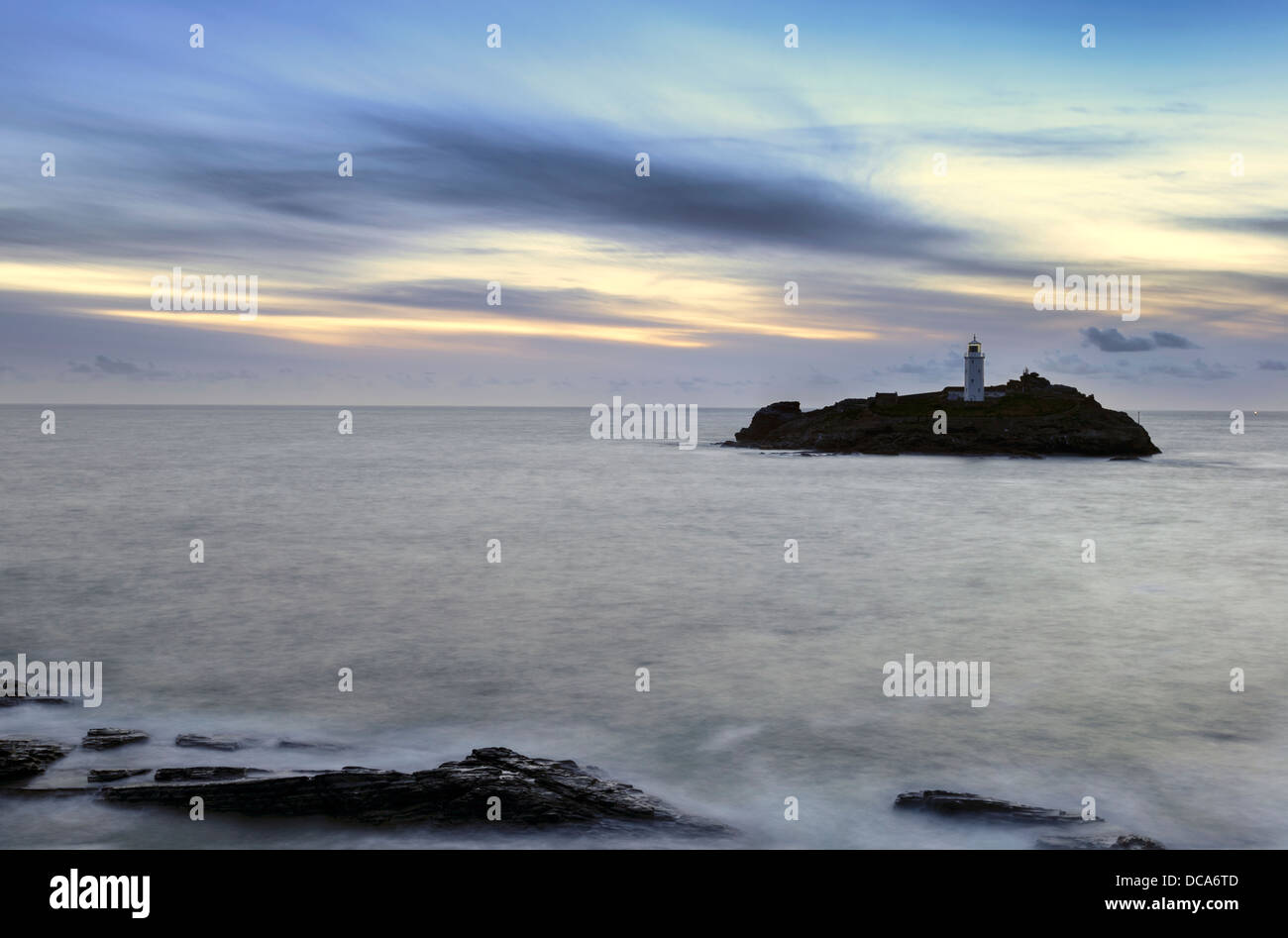 Dusk at Godrevy Lighthouse near St Ives in Cornwall Stock Photo