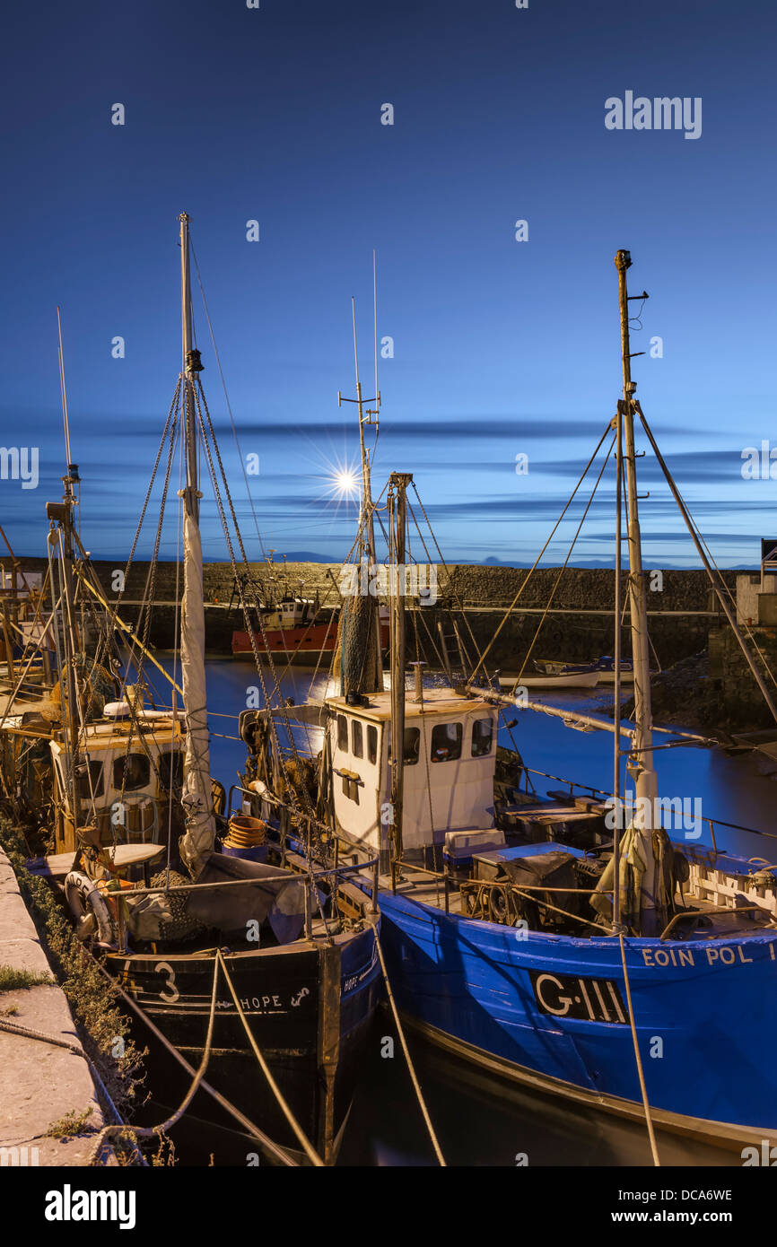 Two traditional fishing boats rest in the harbour at Balbriggan, prior to going out on the day's fishing trips. Stock Photo