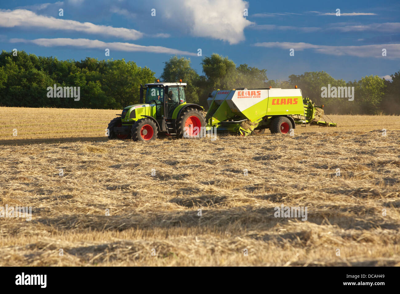 Claas Ares 697 ATZ baling Straw with a Class Quadrant 2200 baler UK Stock  Photo - Alamy