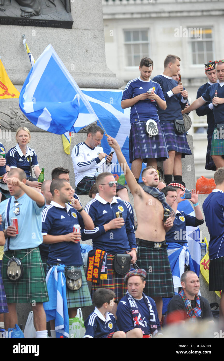 Trafalgar Square, London, UK. 14th August 2013. Flags and kilts as