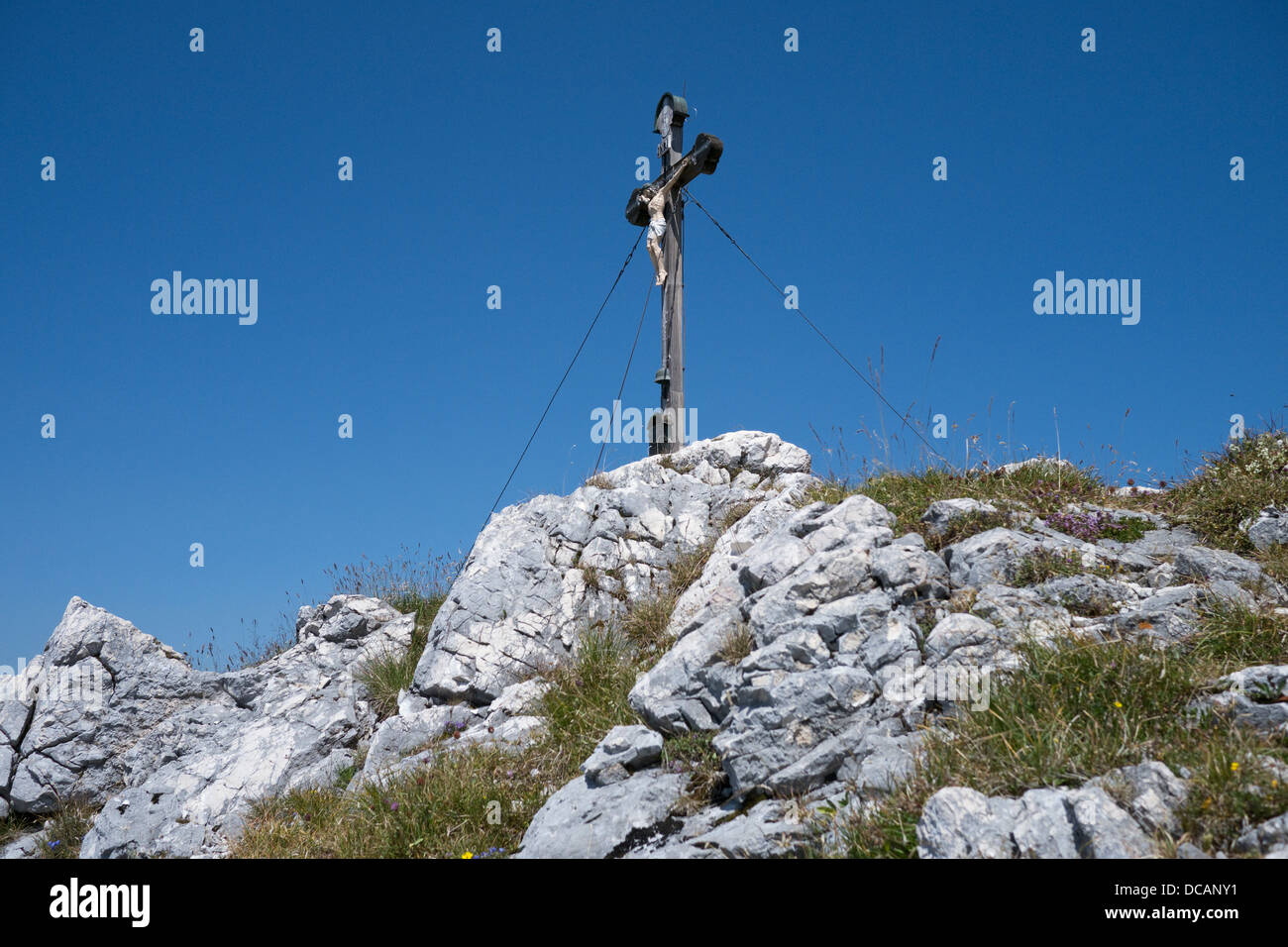 summit cross with Jesus at Bockstein, Bavaria, Germany Stock Photo