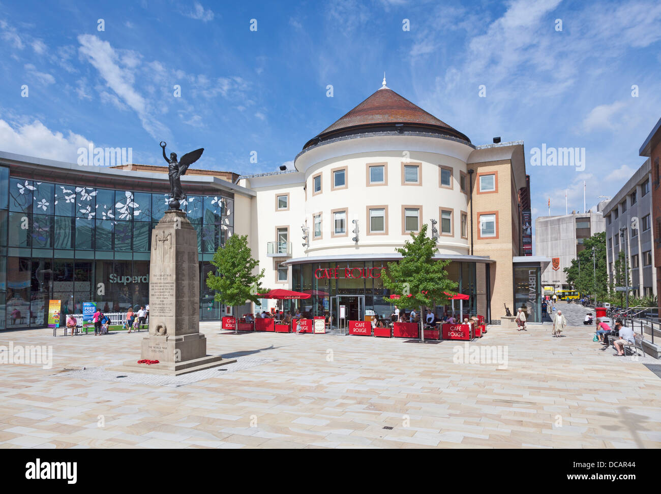 New town square in Woking, Surrey, England, with memorial to the Great War and WWII, shops, library and Café Rouge restaurant Stock Photo