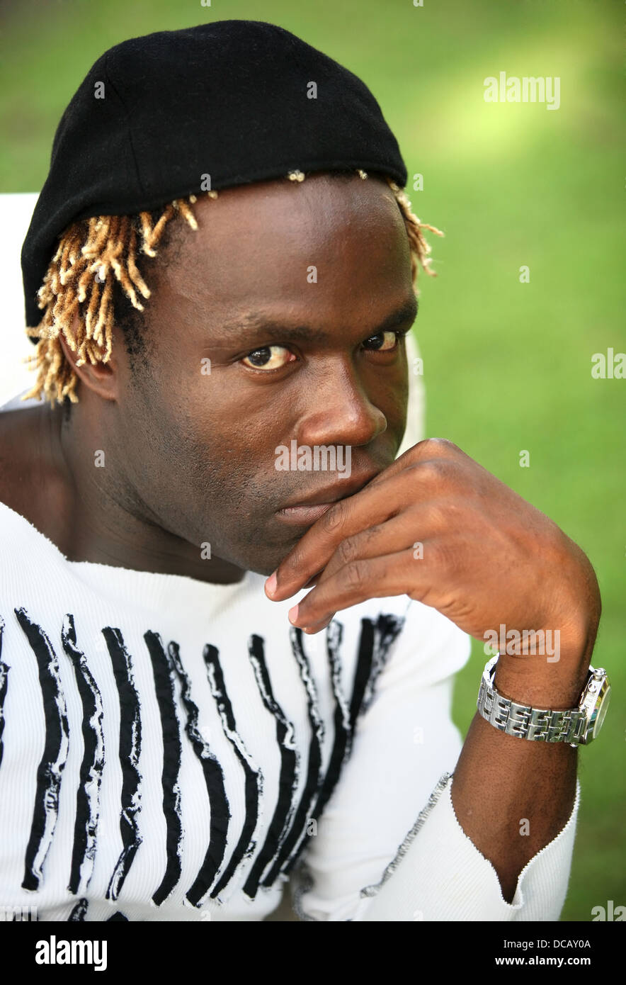 Portrait of young sad man Stock Photo - Alamy
