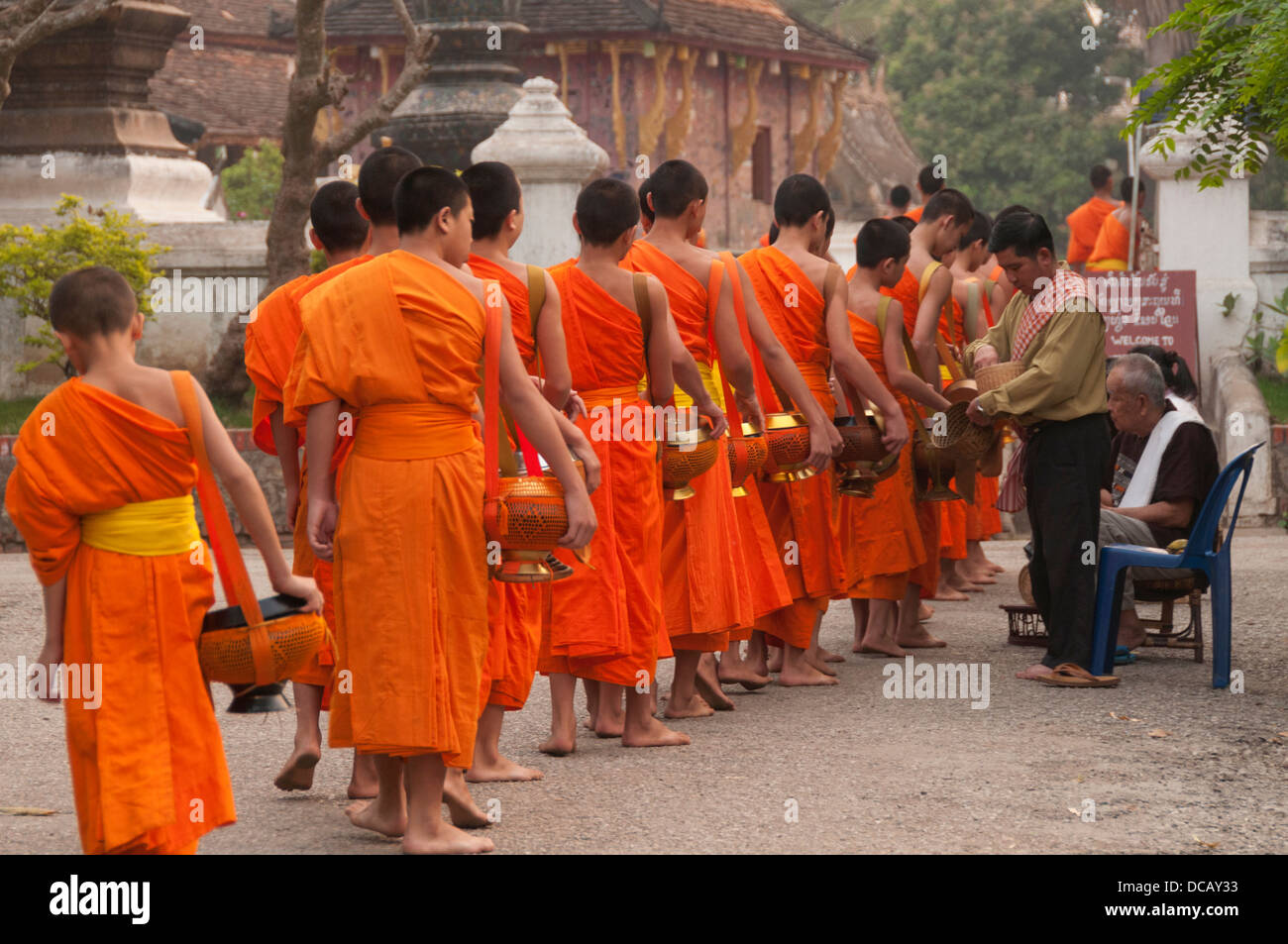 Elk209-1248 Laos, Luang Prabang, monks collecting food alms Stock Photo