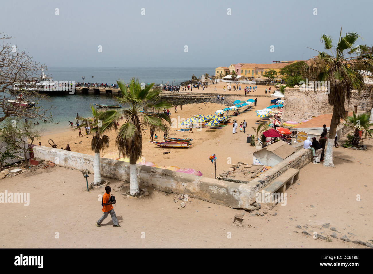Goree Beach, Dakar Ferry and Passengers in the Background. Goree Island, Senegal. Stock Photo