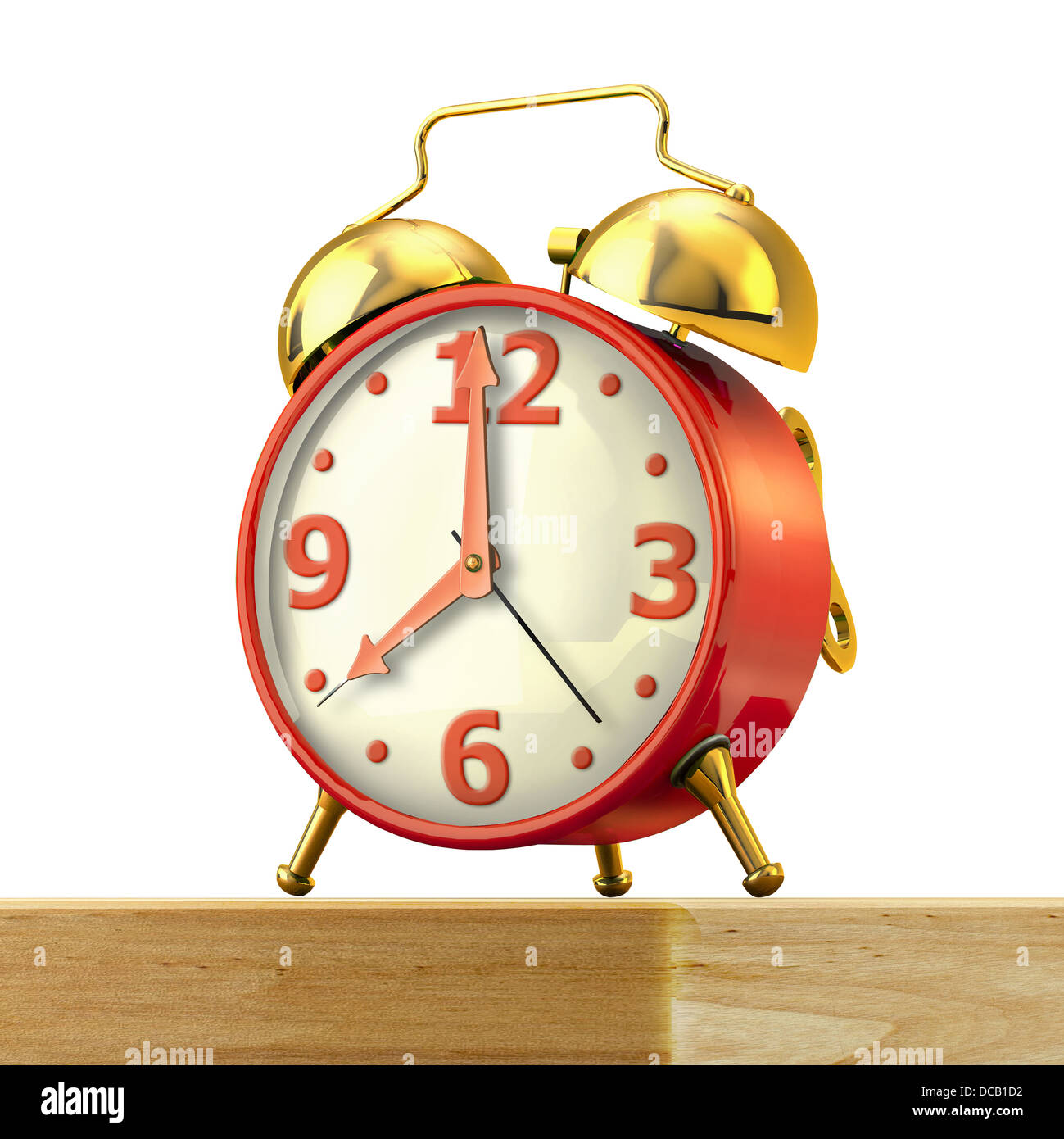 Classic alarm clock with red body and golden bells, on a wood table and white background, close up view. Clipping path included. Stock Photo