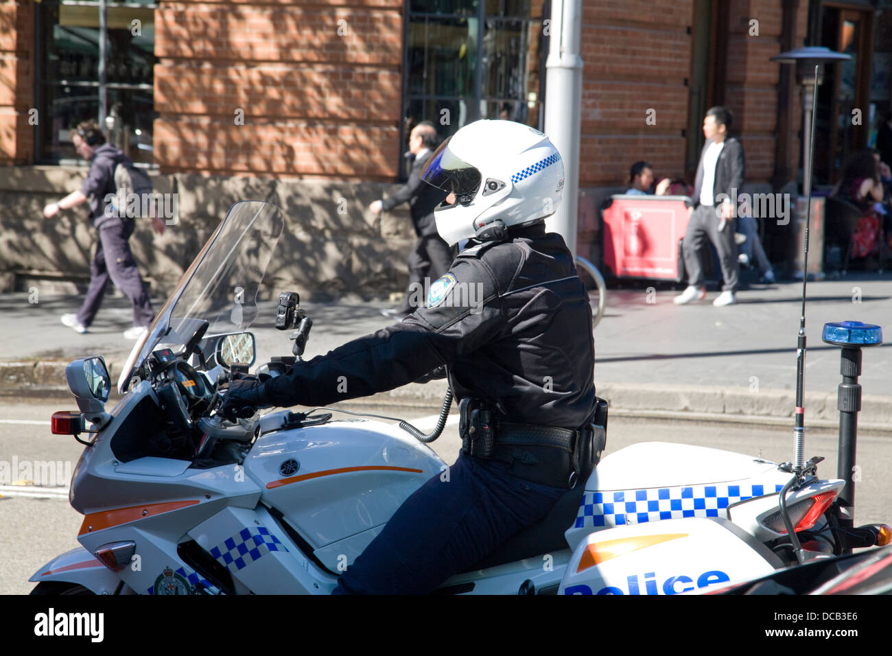 Australian policeman motorcyclist on a motorcycle in lee street,chippendale,Sydney,Australia Stock Photo