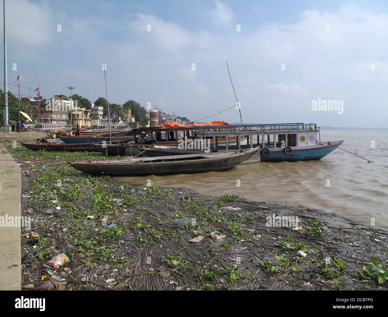 polluted River Ganges in Varanasi India Stock Photo