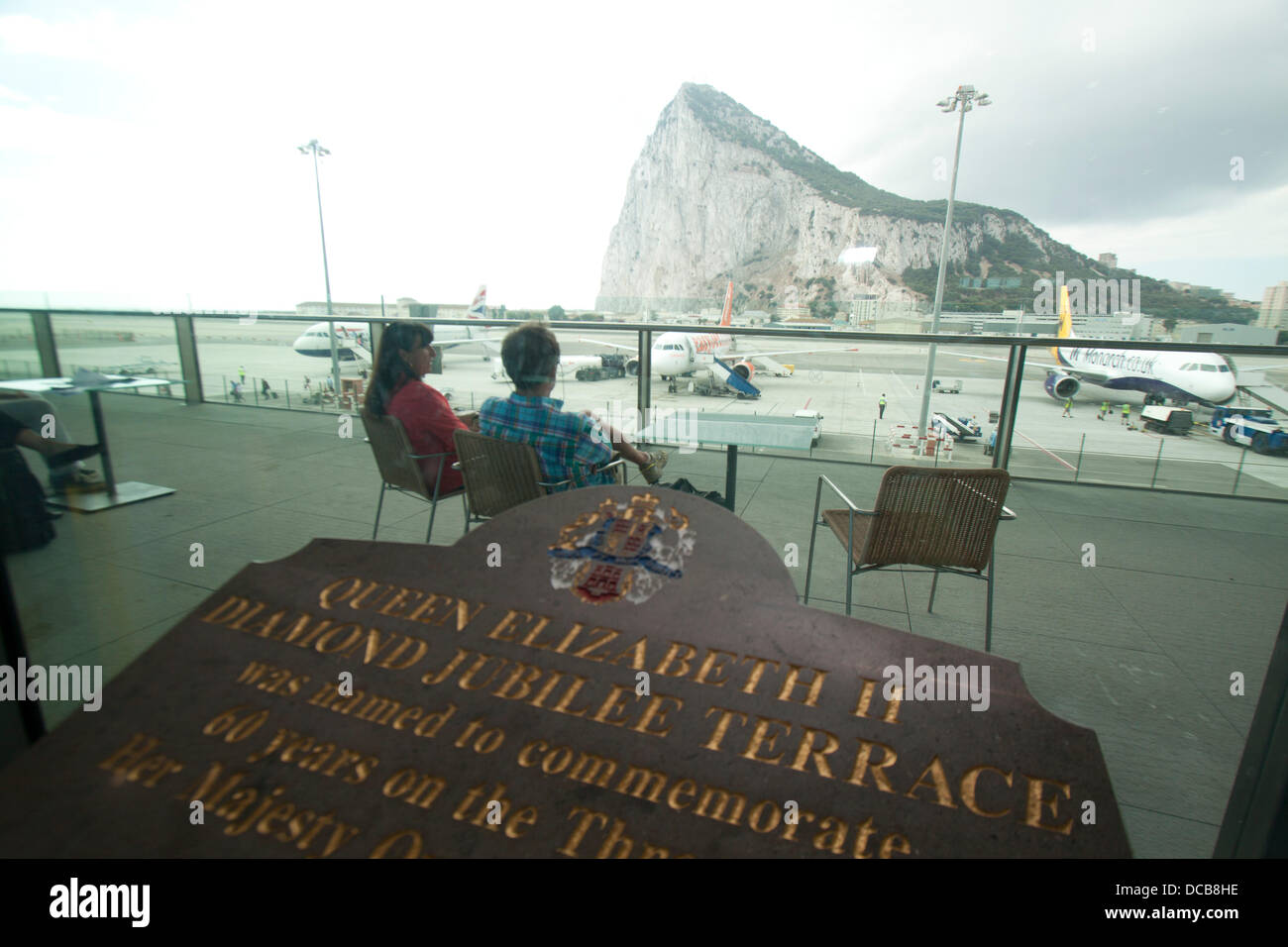 Gibraltar. 14th Aug. 2013.  Passengers watch the Rock from Gibraltar airport's viewing platform . Tensions rise between the British and Spanish governments after Spain imposed additional border checks as Britain sends warships to Gibraltar Credit:  amer ghazzal/Alamy Live News Stock Photo