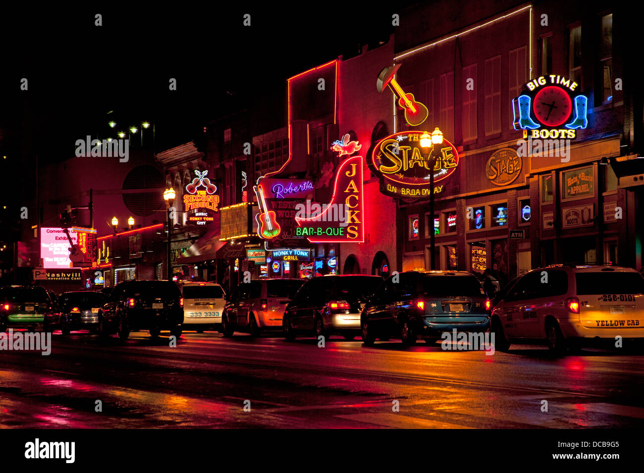 Neon bar signs at night on Main Street in Nashville Tennessee Stock