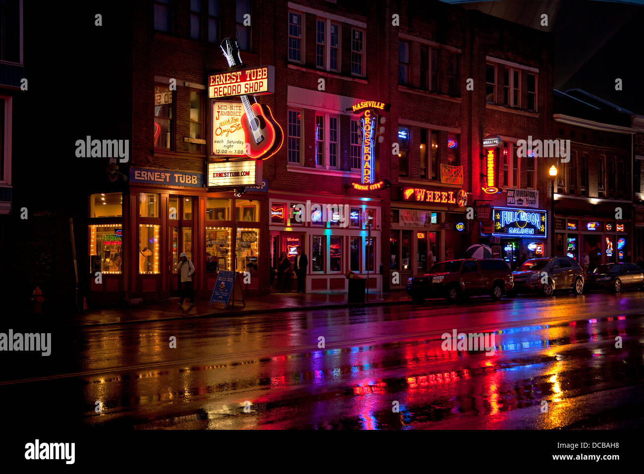 Neon bar signs at night on Main Street in Nashville Tennessee Stock