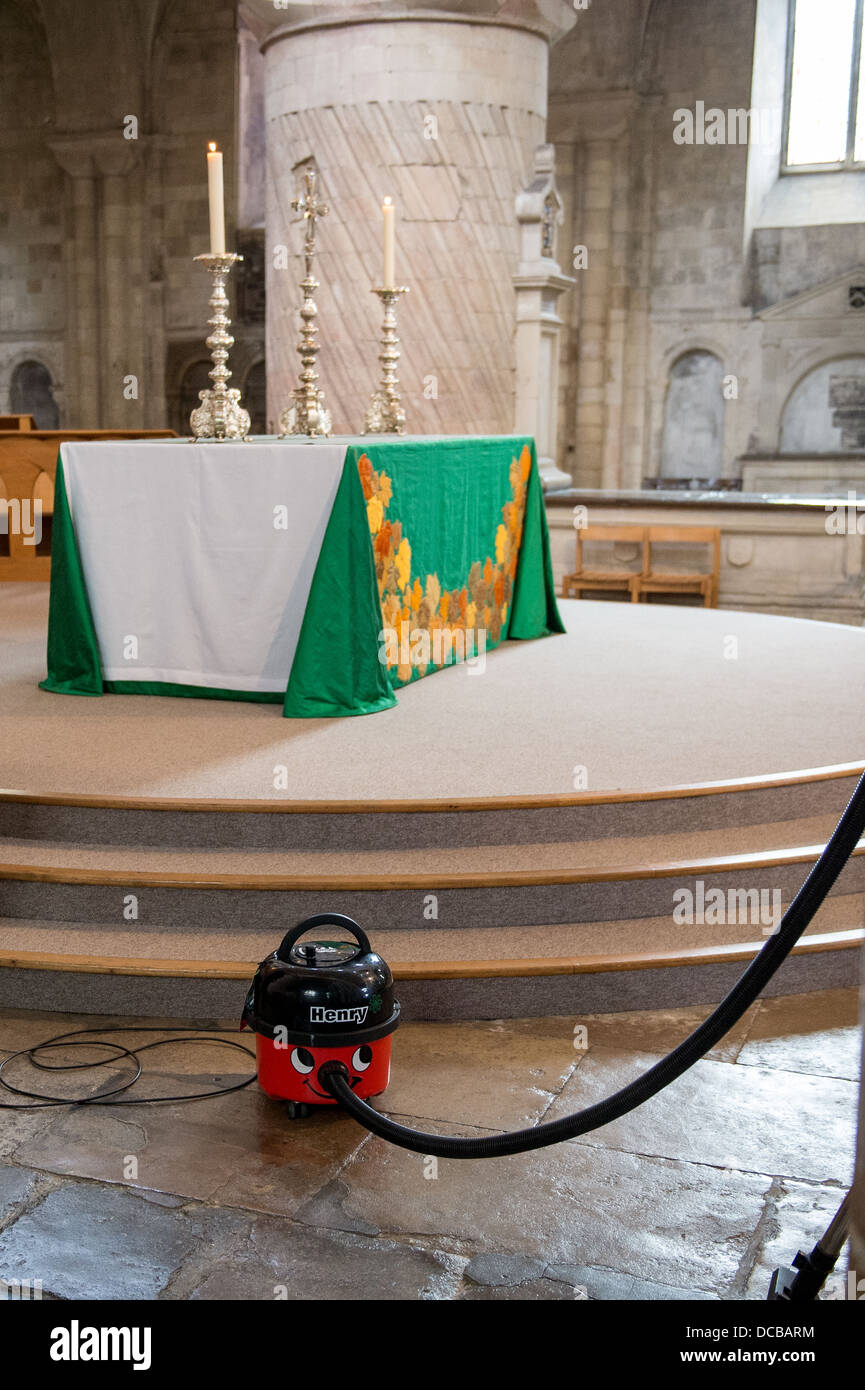 The Altar and a Henry Hoover at Norwich cathedral Stock Photo