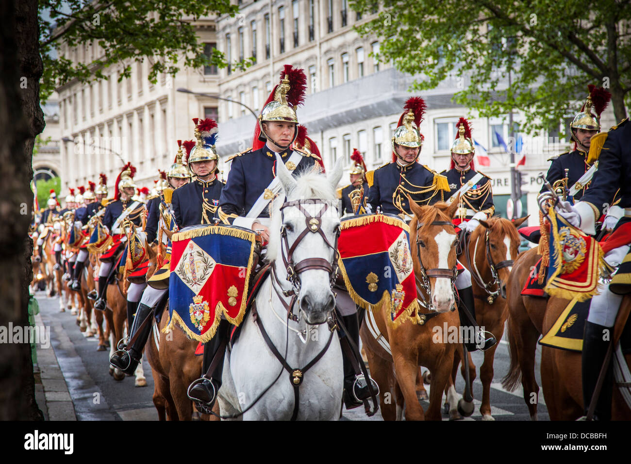 Members of the Republican Guard Cavalry Regiment ride down Quai de Gesvres, Paris, Ile-de-France, France Stock Photo